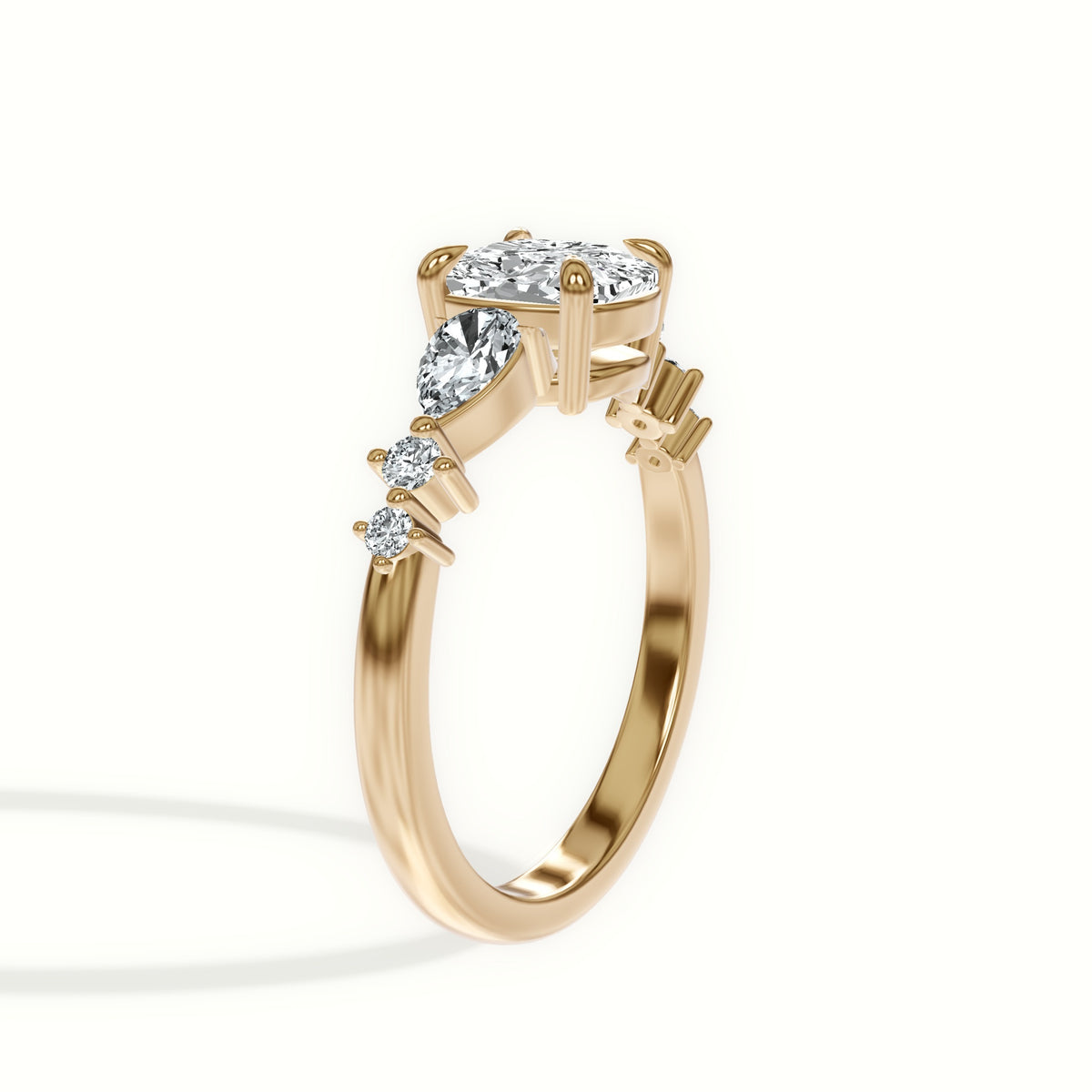 Cascading Pear and Round Diamond Engagement Ring
