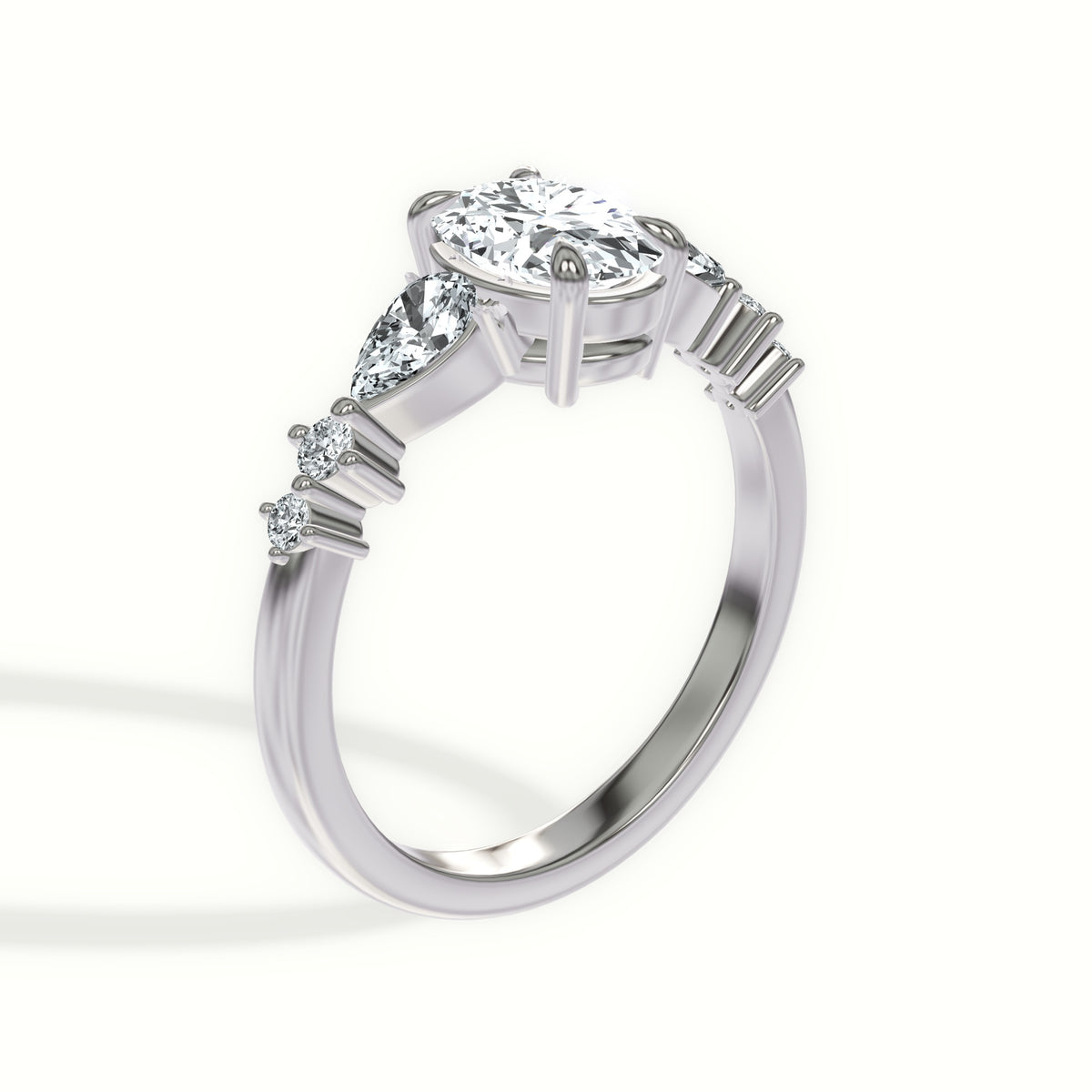 Cascading Pear and Round Diamonds Engagement Ring