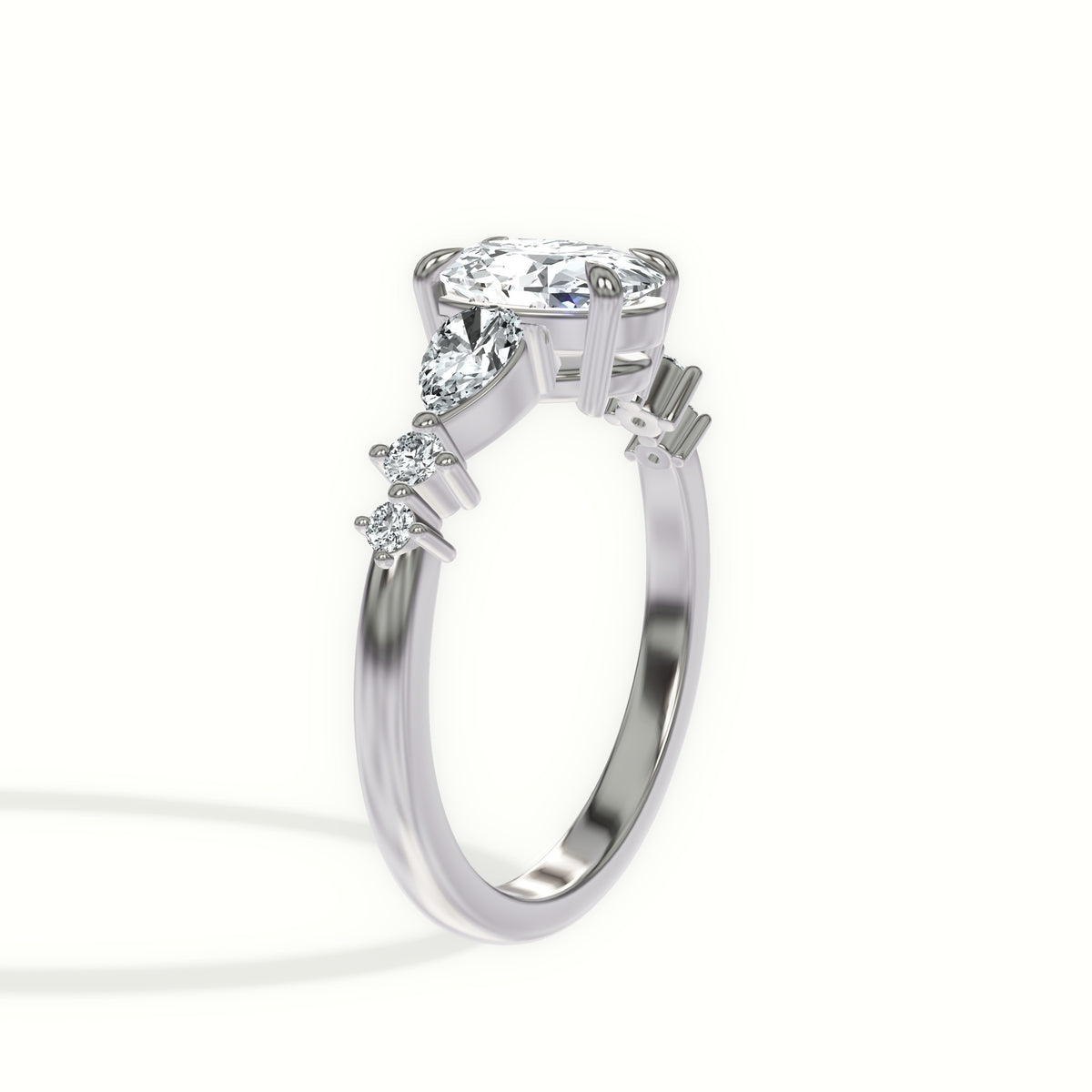 Cascading Pear and Round Diamonds Engagement Ring