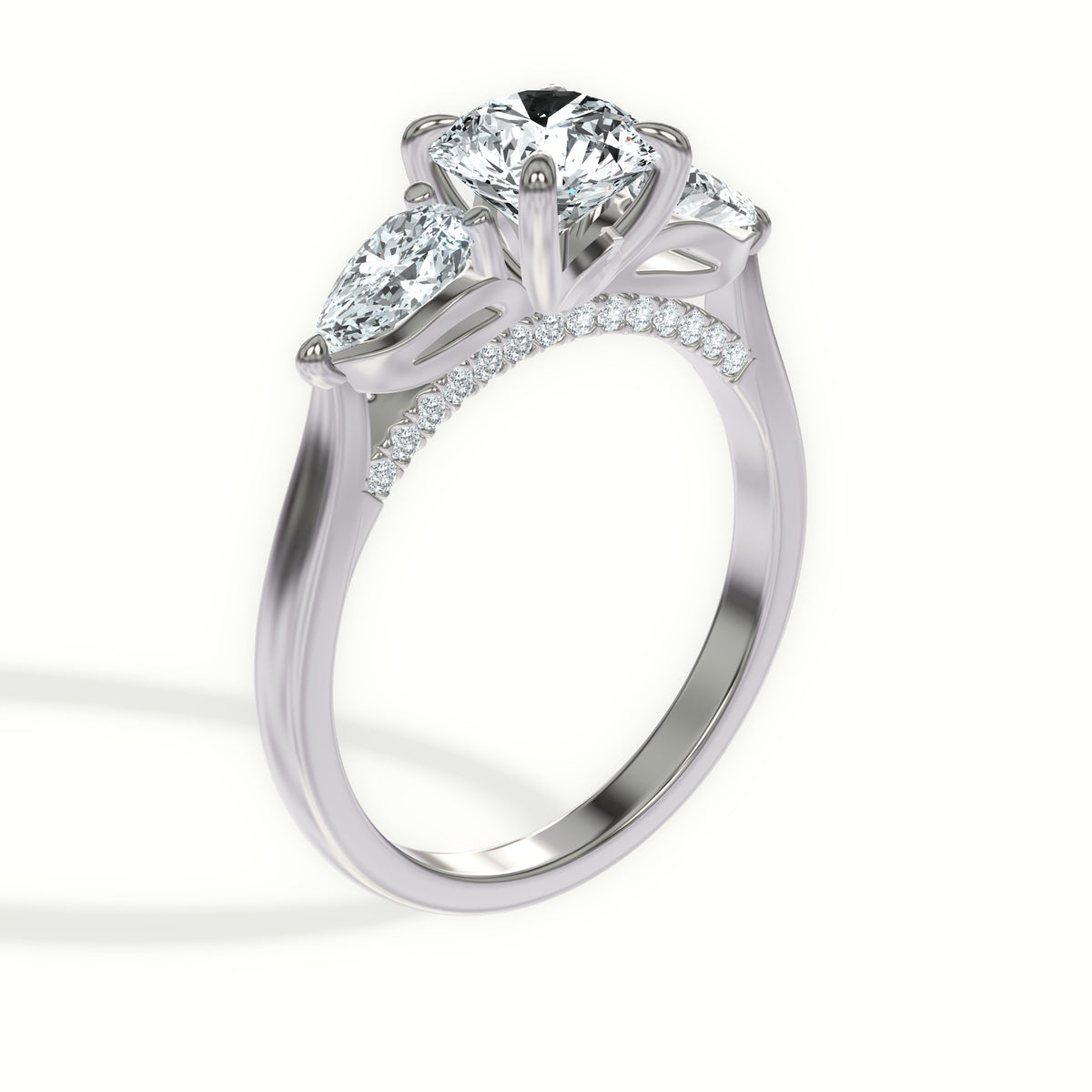 Sculpted Pear Three Stone Engagement Ring with Pavé Bridge
