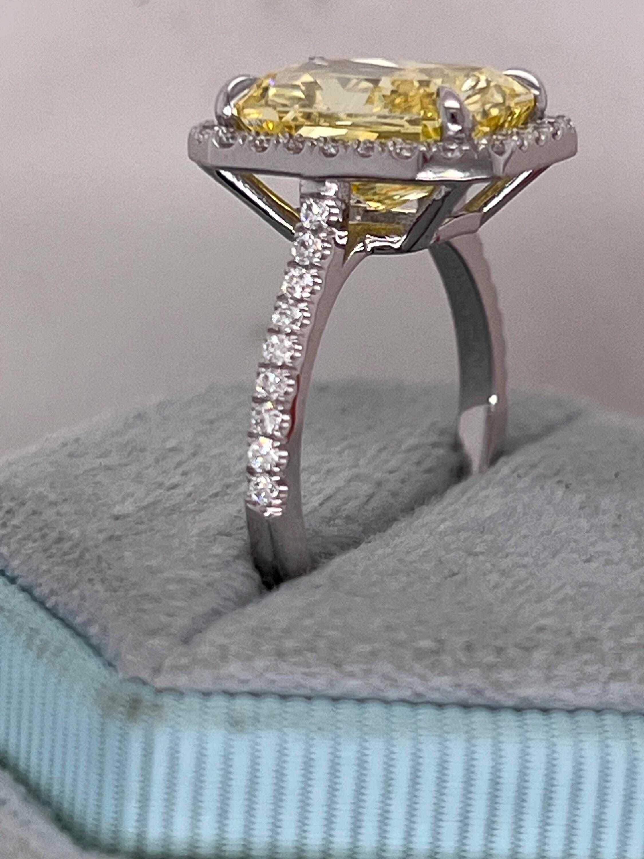 5.5 Carat Total Fancy Vivid Yellow Elongated Radiant Cut Diamond Halo Engagement Ring