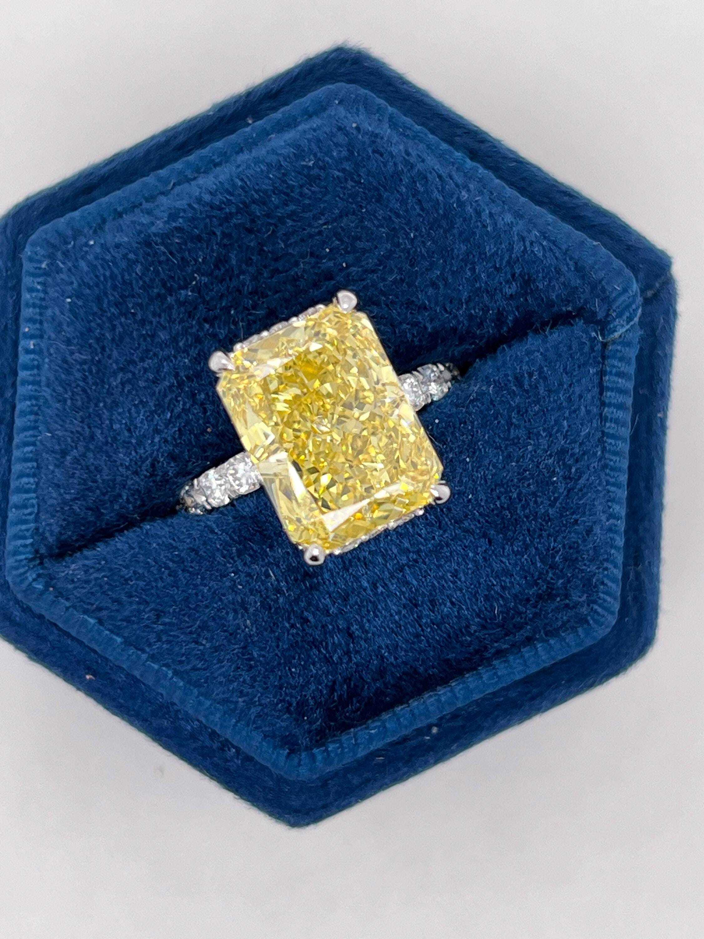 7.25 Carat Total Fancy Vivid Yellow VVS1 Clarity Elongated Radiant Cut Diamond Hidden Halo Engagement Ring