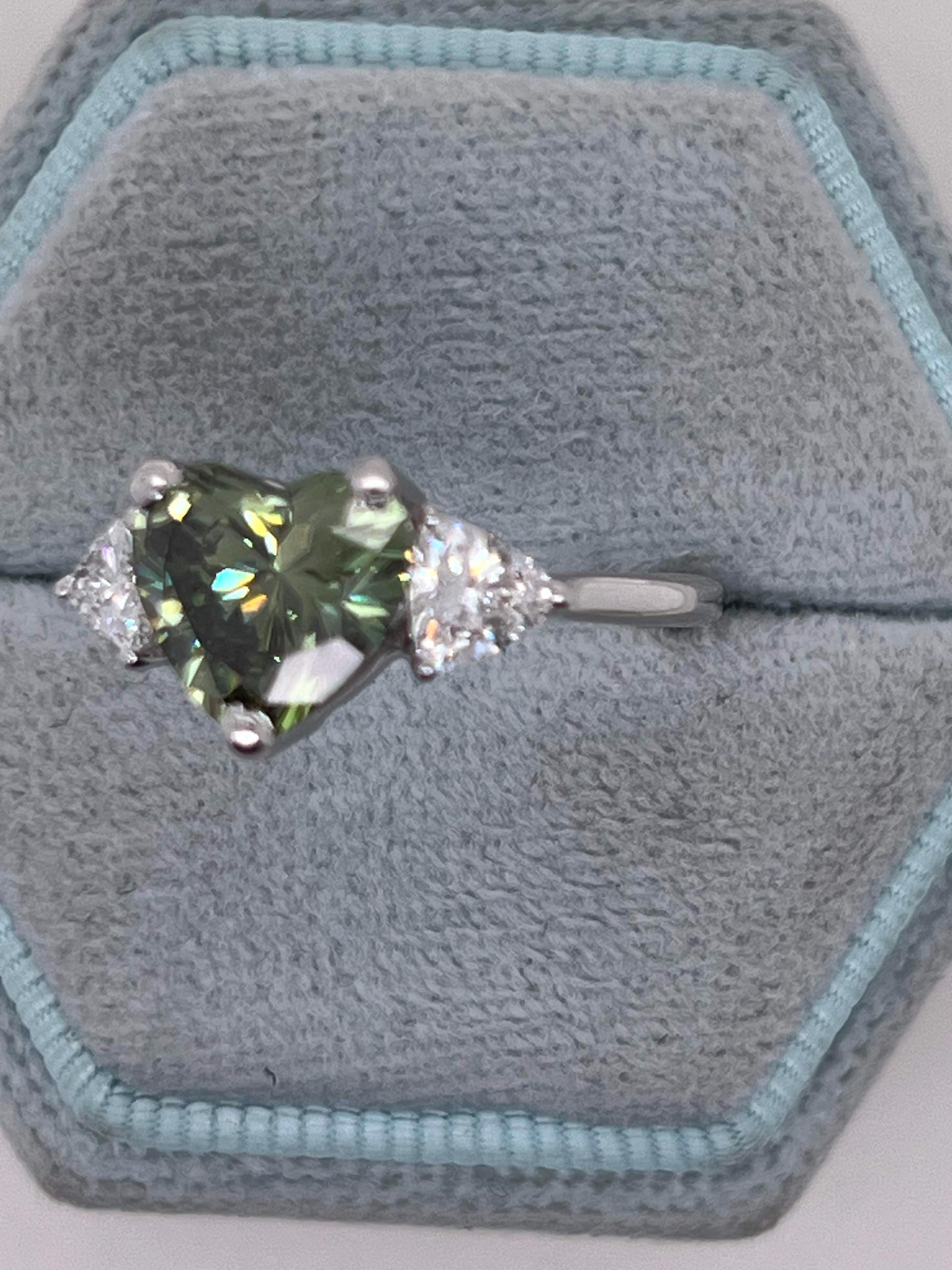 2.75 Carat Fancy Vivid Green Heart Cut Diamond Three Stone Engagement Ring Side Trillions