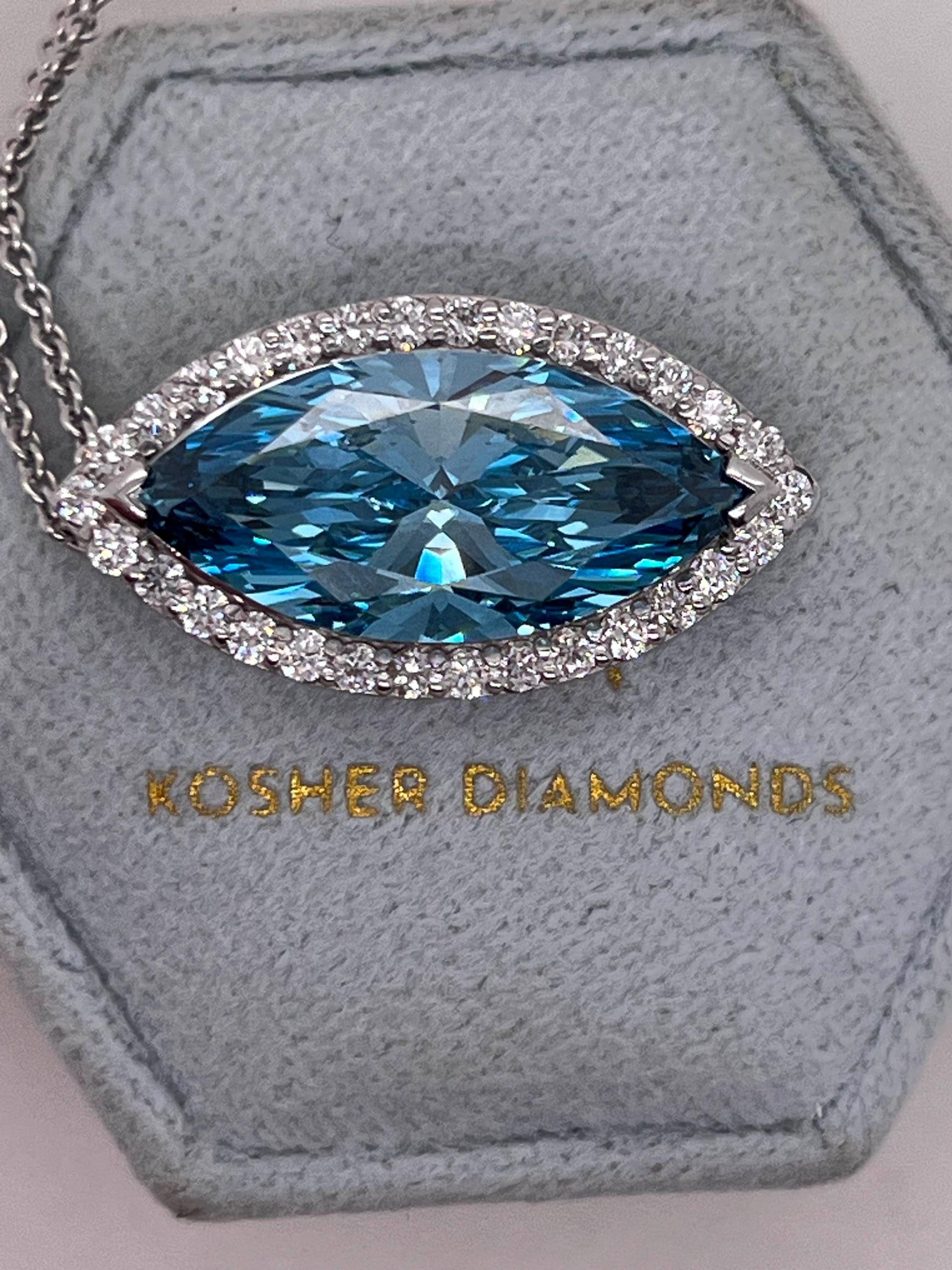 7.5 Carat Fancy Vivid Blue Color Marquise Cut Diamond Halo Pendant