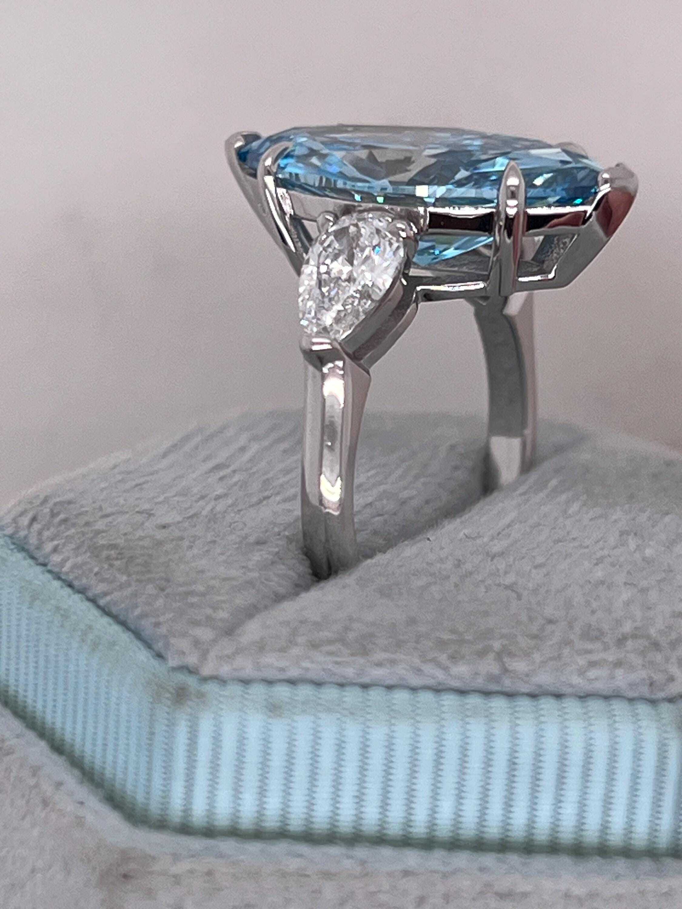 7 Carat Fancy Vivid Blue Color Marquise Three Stone Engagement Ring Side Pear Diamonds
