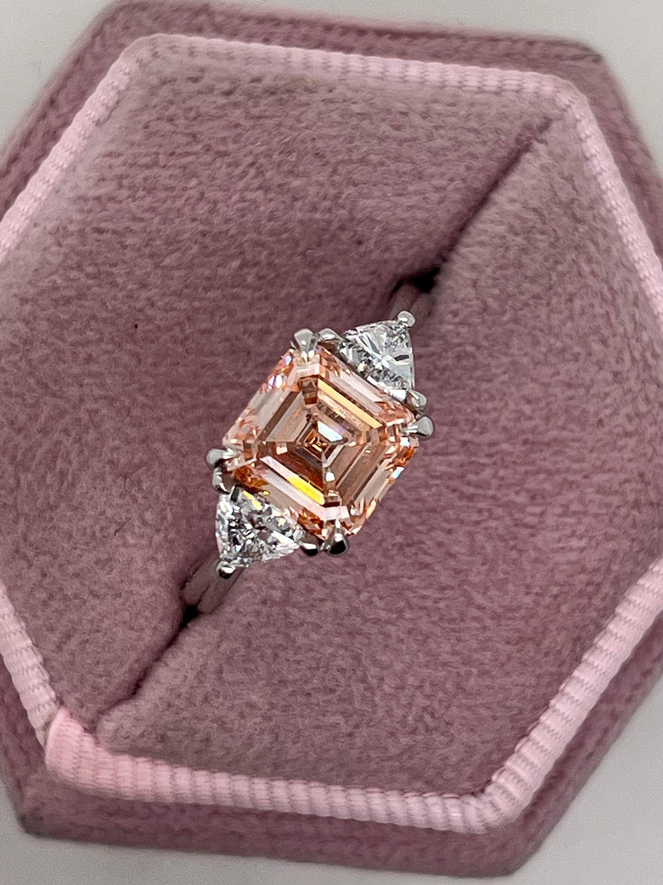 2.5 Carat Fancy Vivid Pink Asscher Cut Three Diamond Engagement Ring Side Trillions