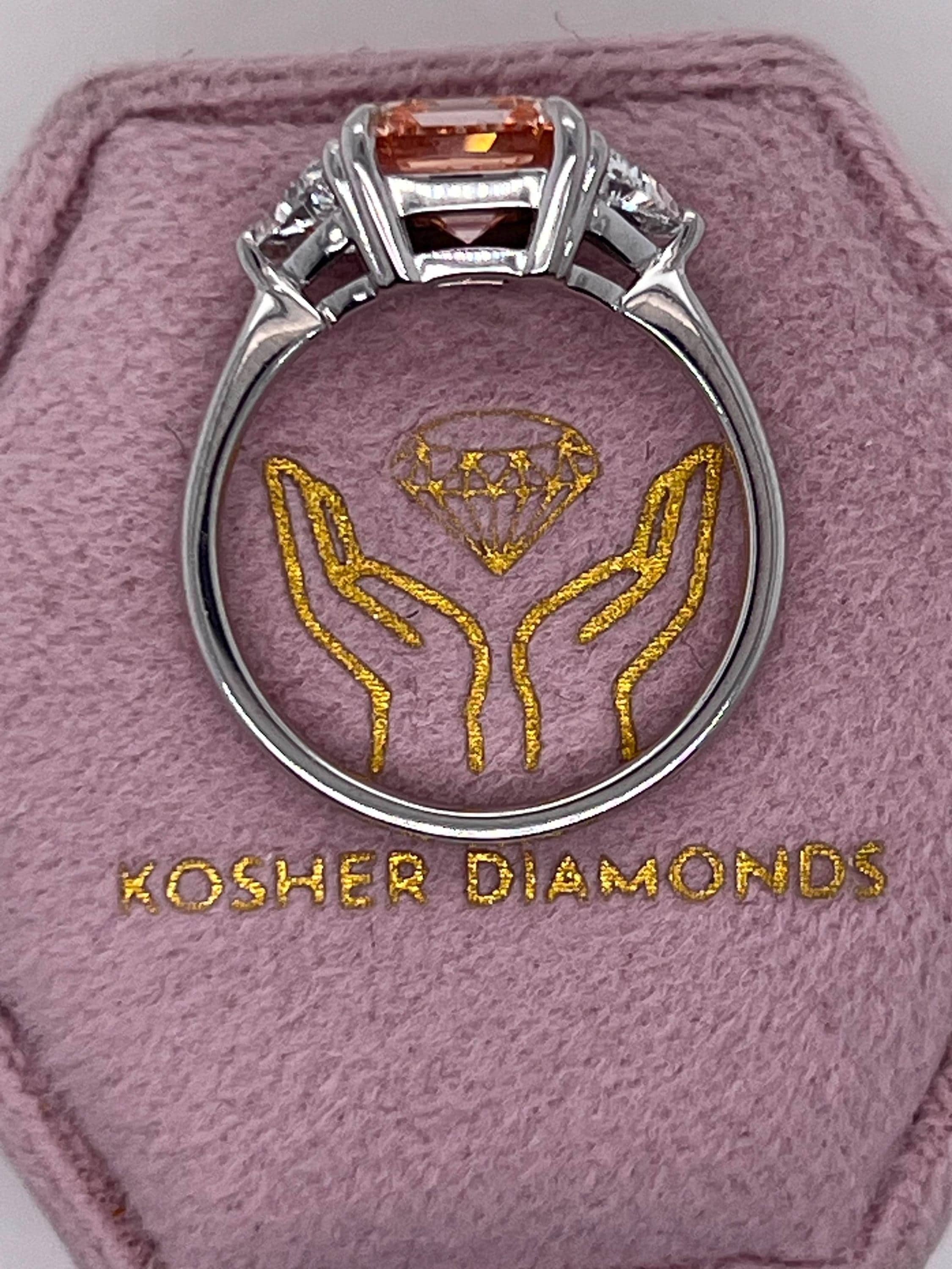 2.5 Carat Fancy Vivid Pink Asscher Cut Three Diamond Engagement Ring Side Trillions