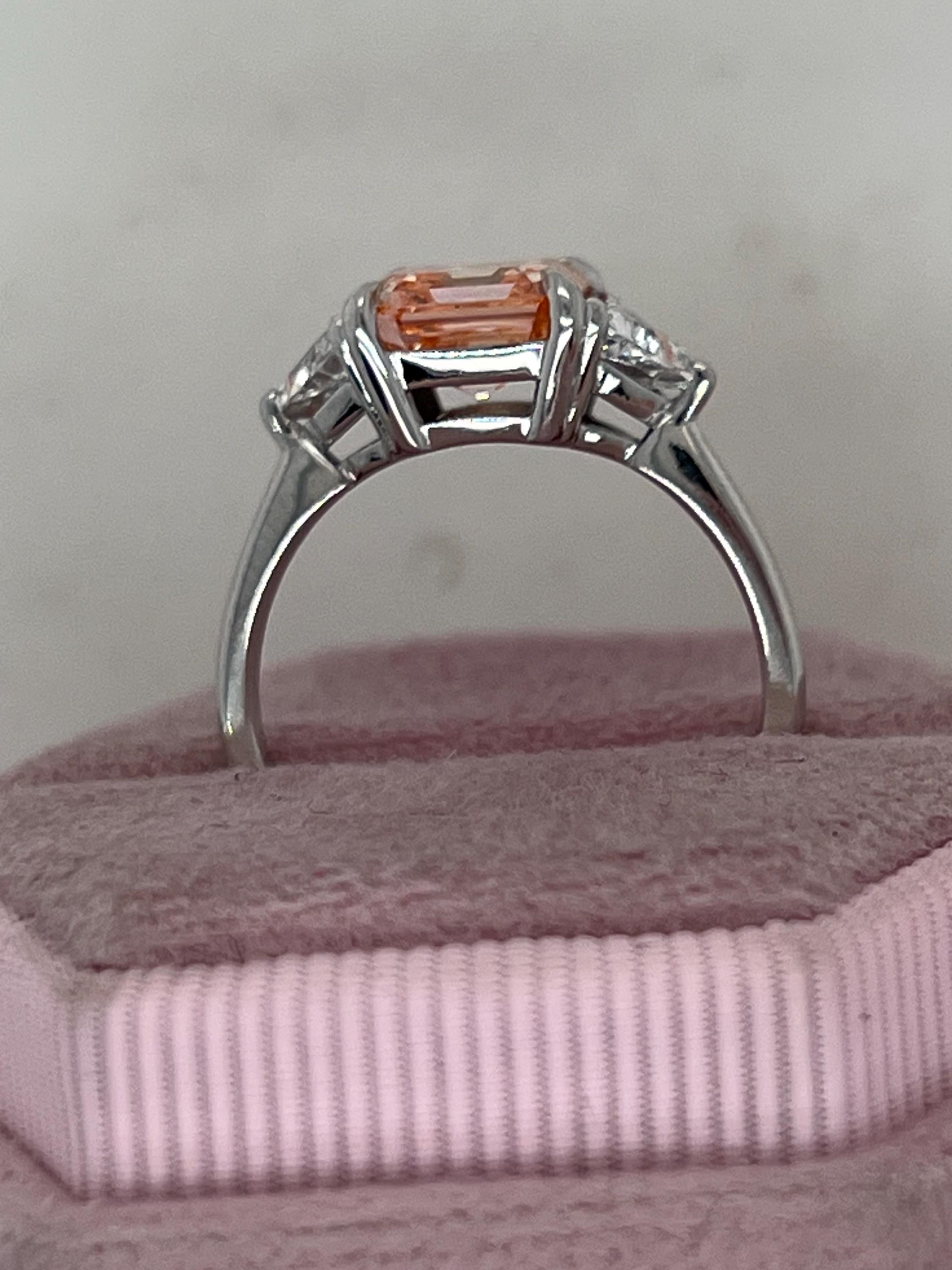 2.5 Carat Fancy Vivid Pink Asscher Cut Three Diamond Engagement Ring Side Trillions