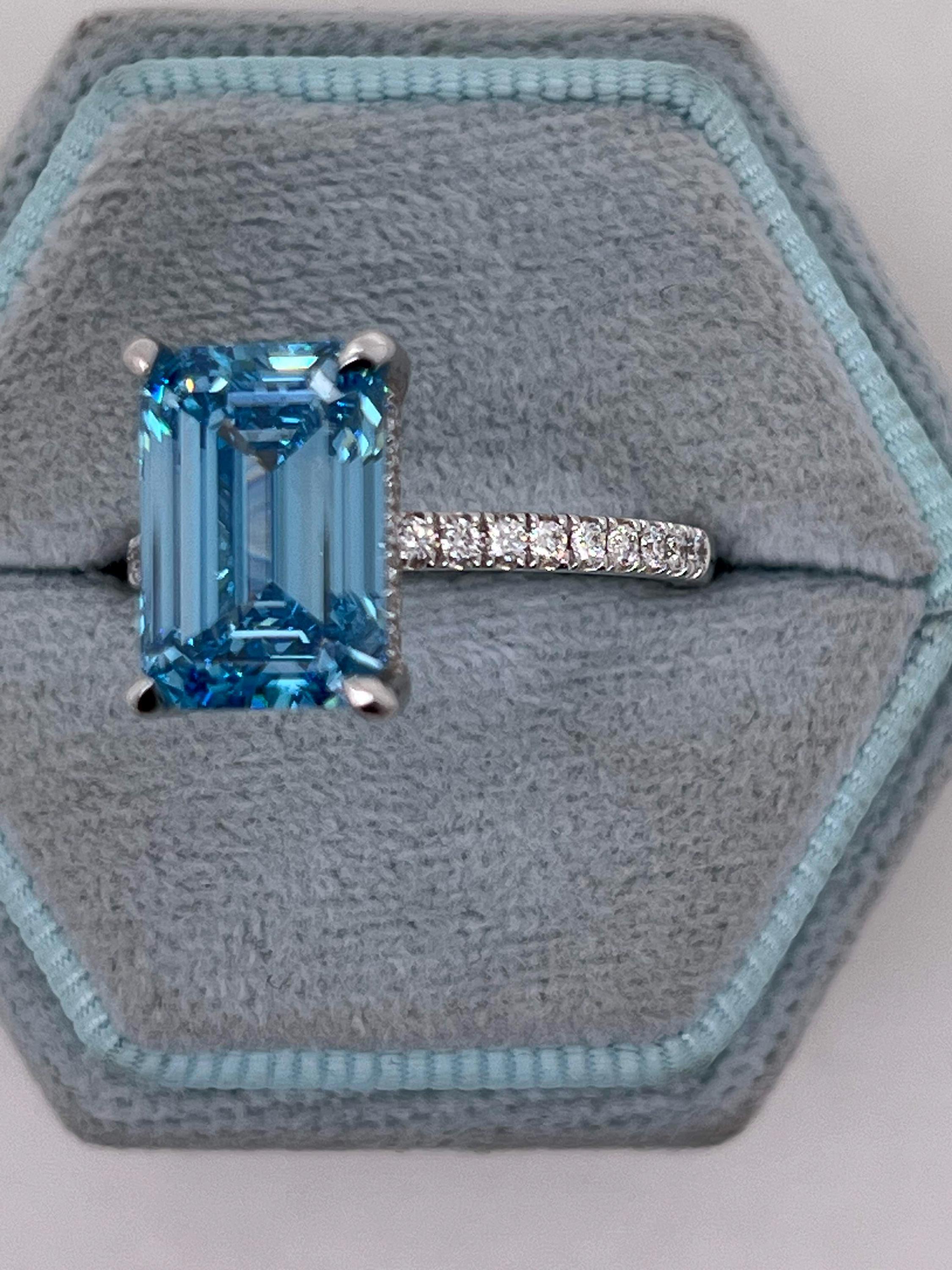 5.25 Carat Fancy Vivid Blue Color Emerald Cut Diamond Hidden Halo Engagement Ring