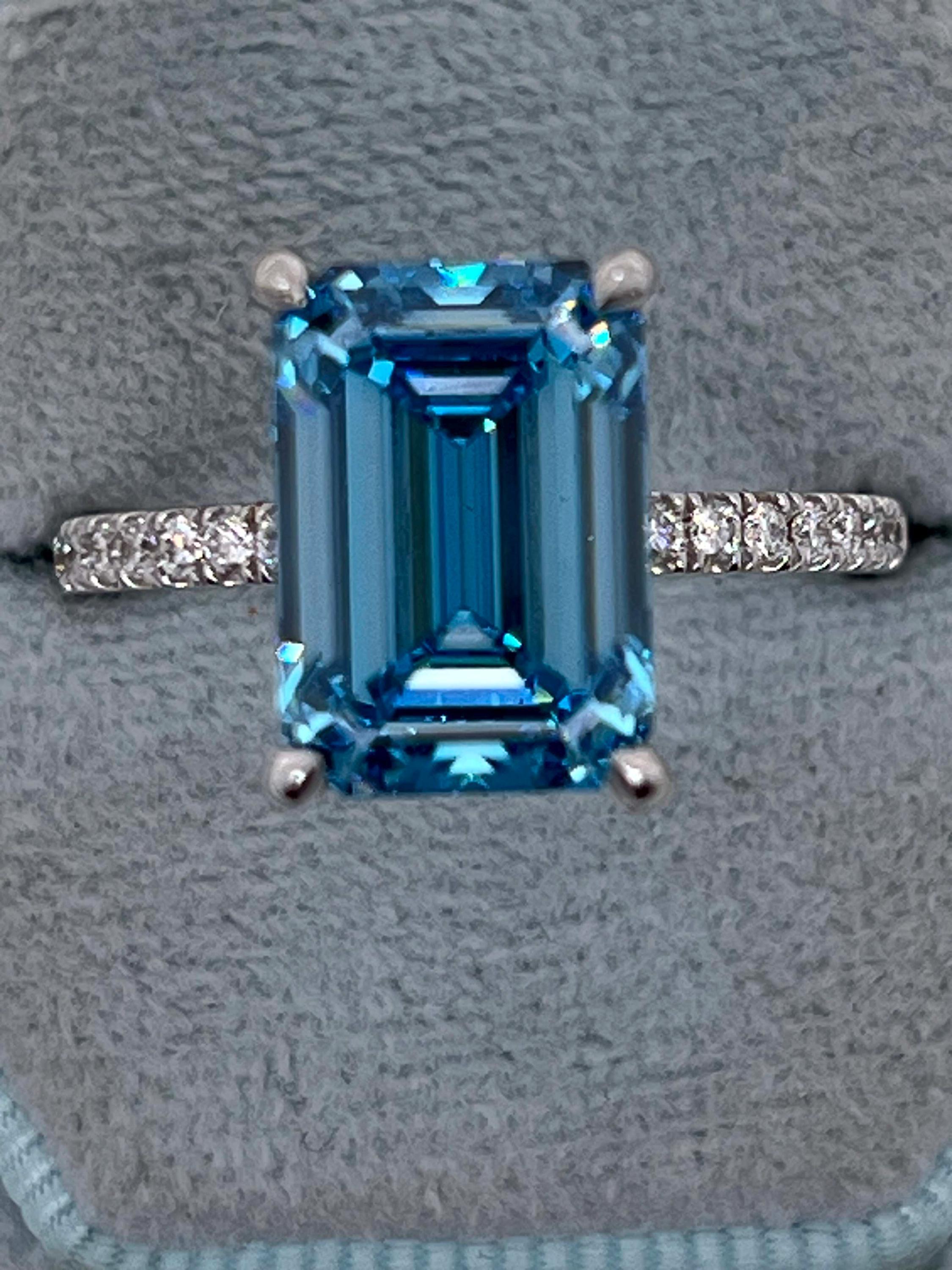 5.25 Carat Fancy Vivid Blue Color Emerald Cut Diamond Hidden Halo Engagement Ring
