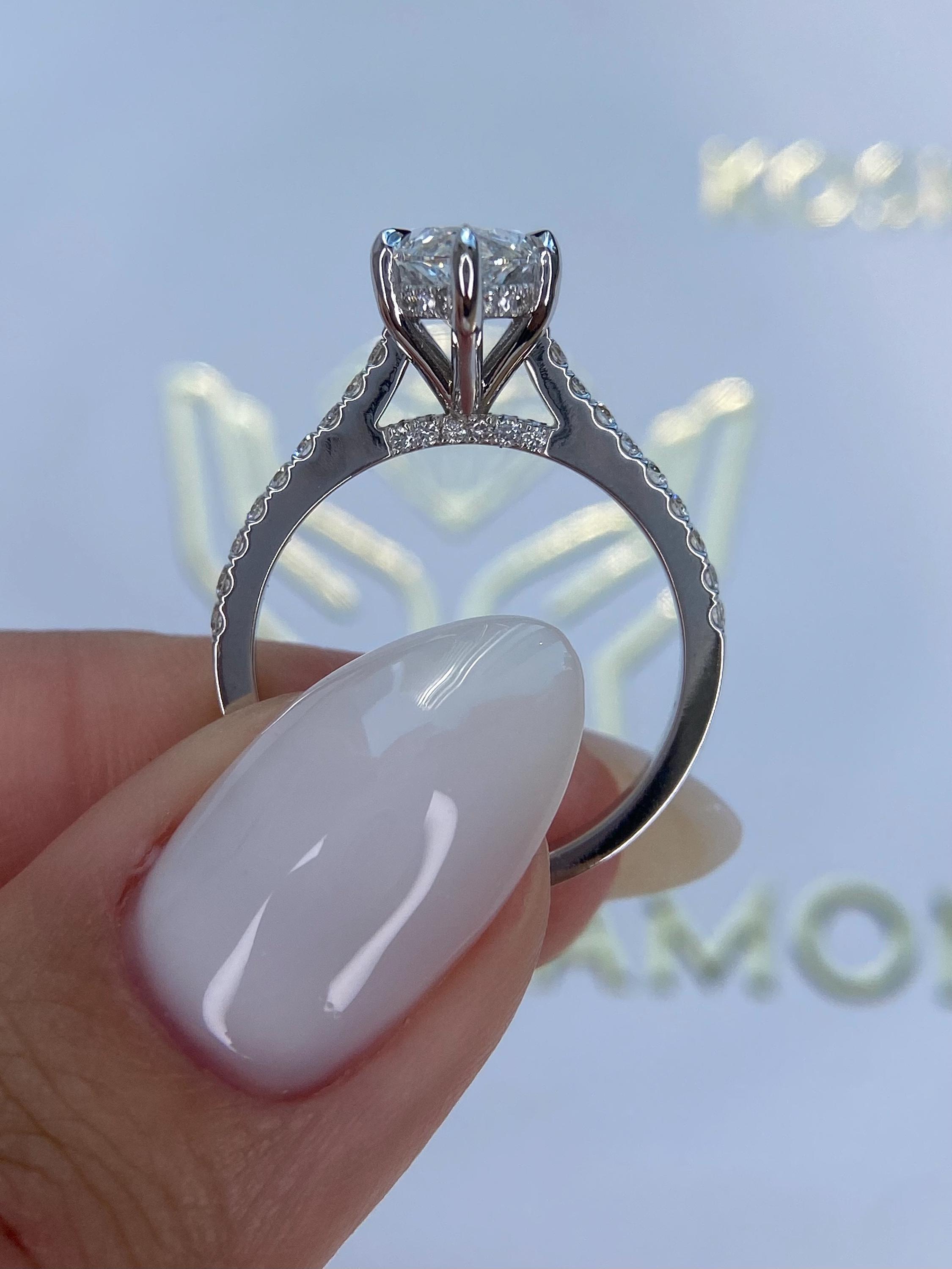 Unique 4.50 carat Marquise Cut Diamond Hidden Halo Cathedral Set Engagement Ring