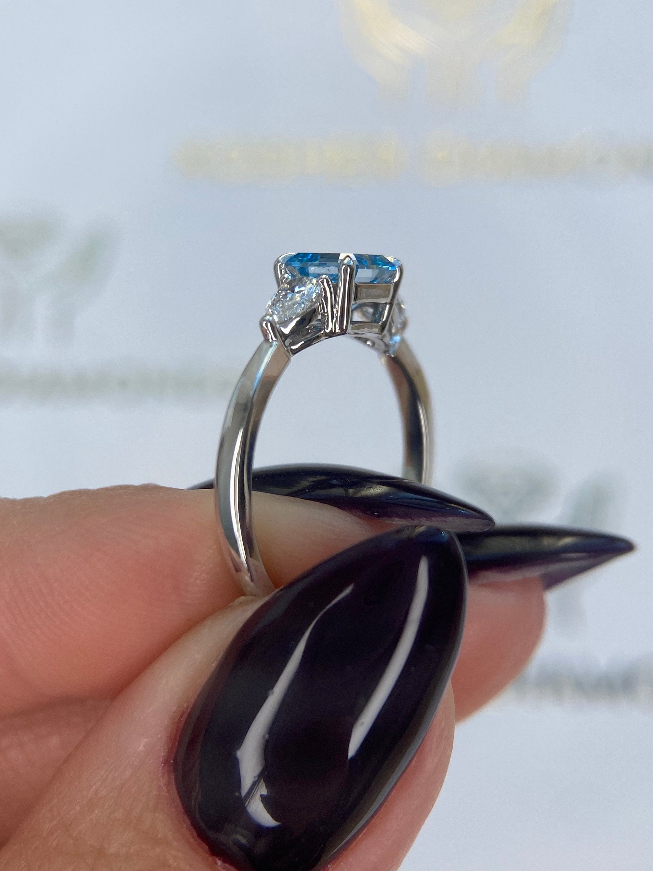 1.3 Carat Fancy Vivid Blue Asscher Cut Diamond Three Stone Engagement Ring, Side Pear Diamonds