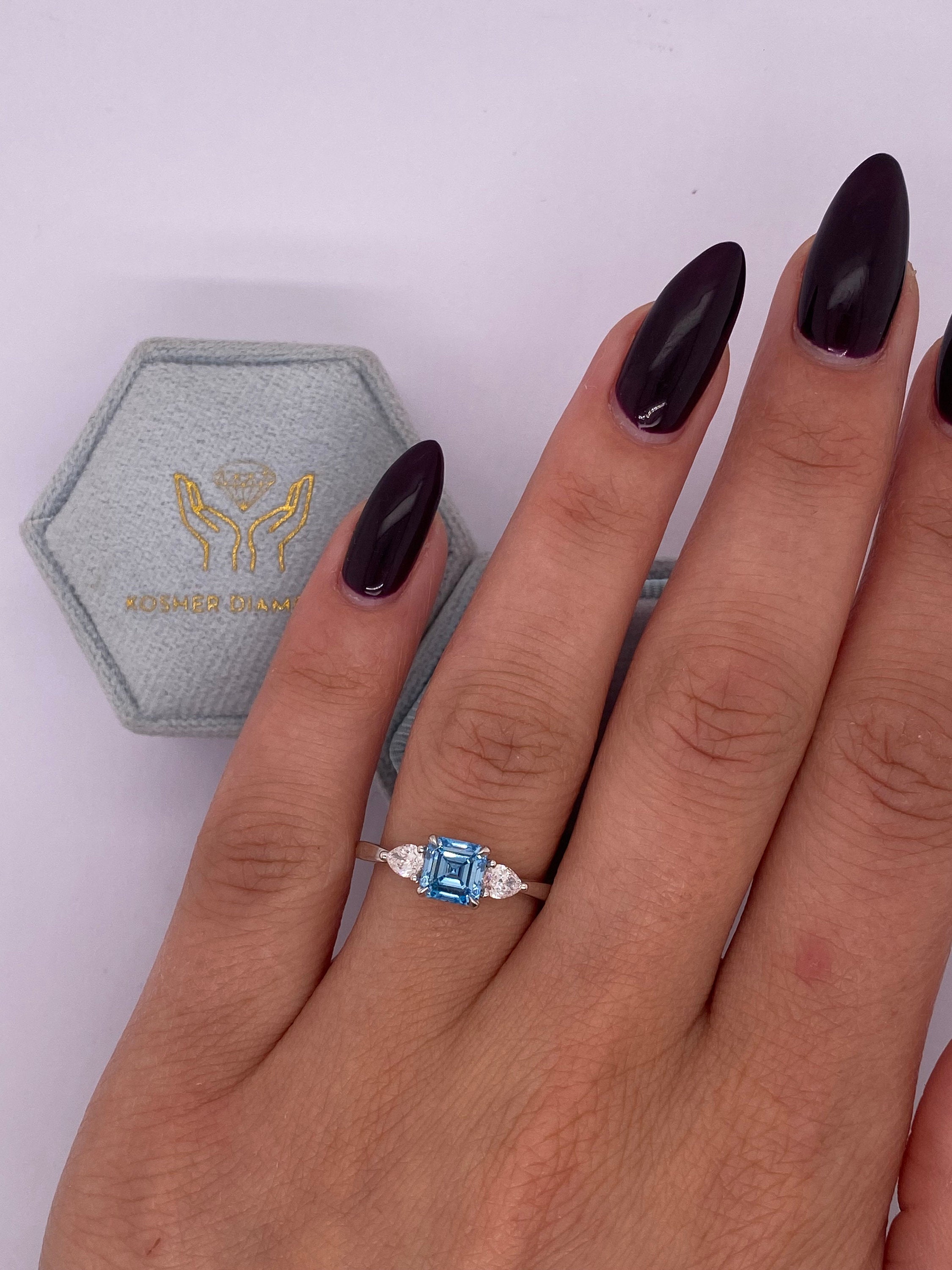 1.3 Carat Fancy Vivid Blue Asscher Cut Diamond Three Stone Engagement Ring, Side Pear Diamonds