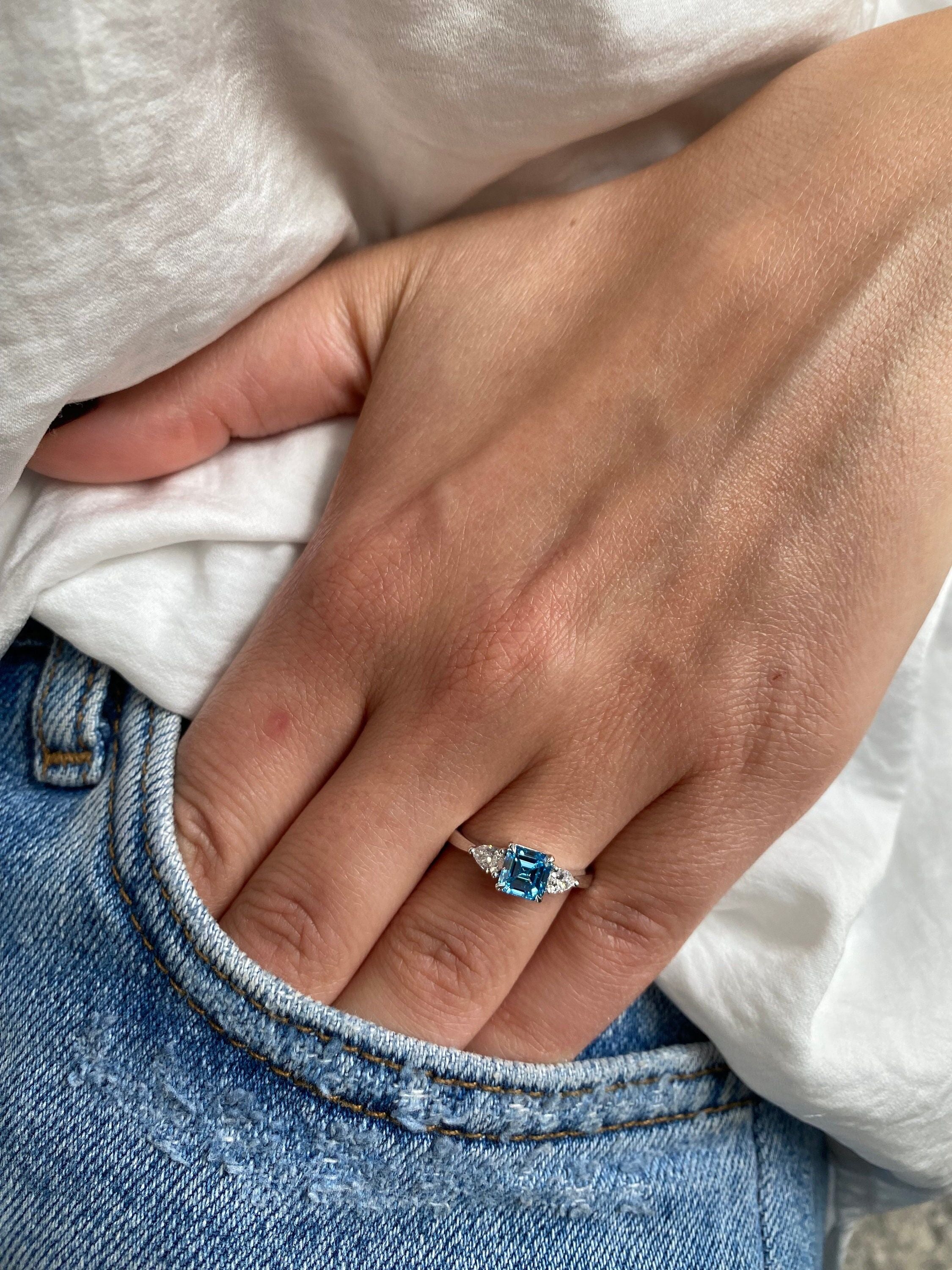 1.3 Carat Fancy Vivid Blue Asscher Cut Diamond Three Stone Engagement Ring, Side Pear Diamonds