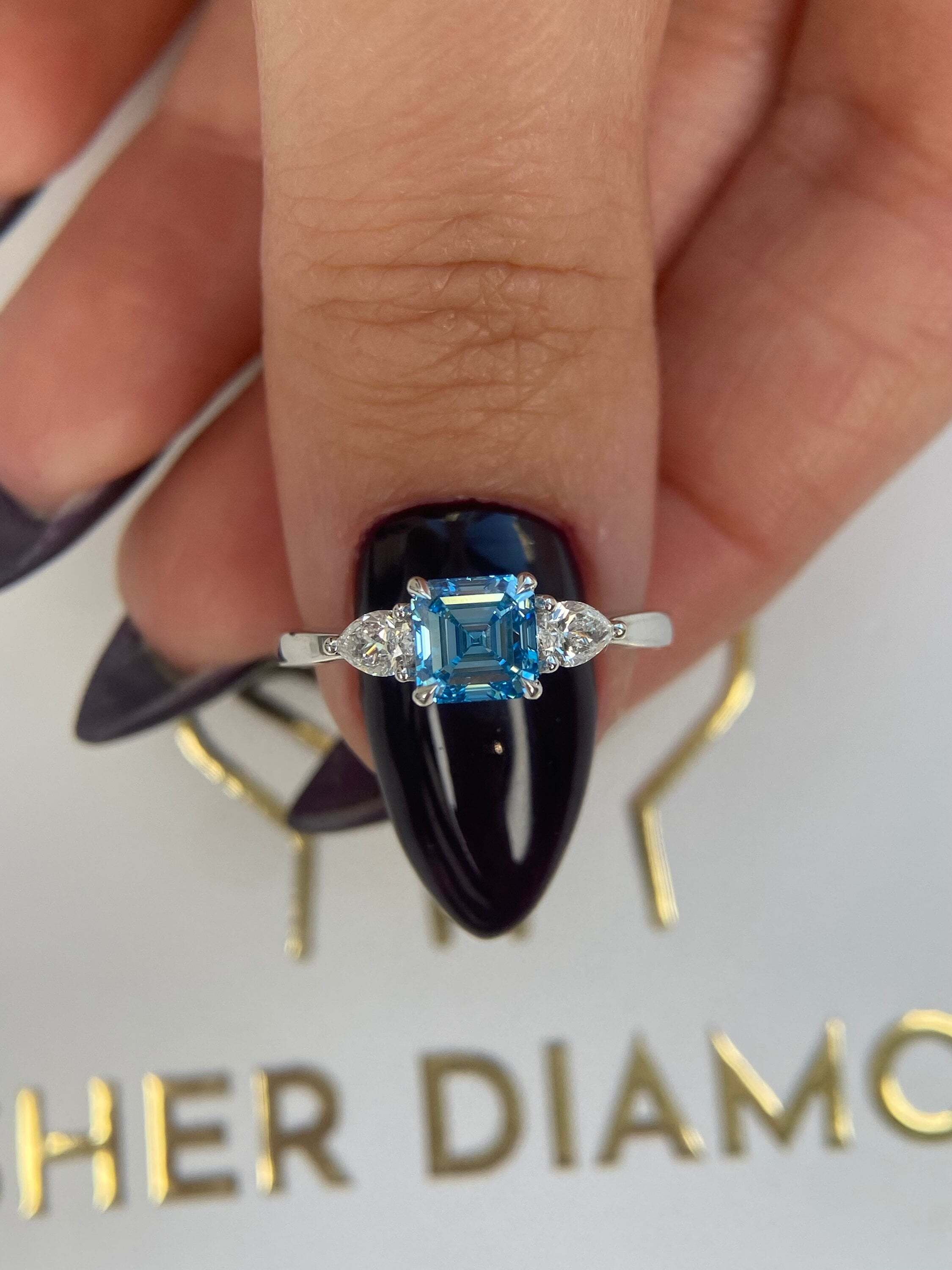 1.3 Carat Fancy Vivid Blue Asscher Cut Diamond Three Stone Engagement Ring, Side Pear Diamonds