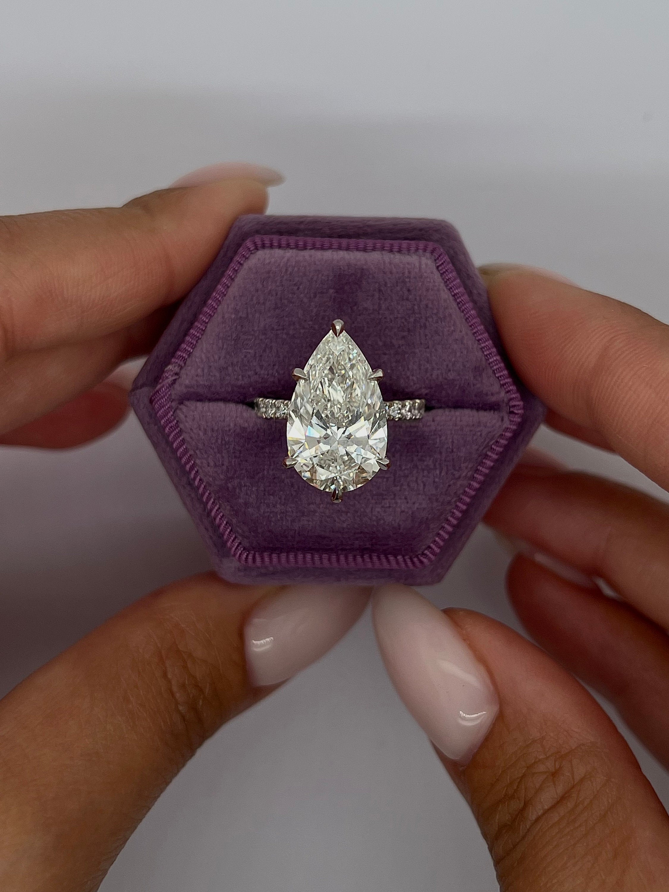 7.5 Carat Pear Cut Hidden Halo Diamond Engagement Ring with Pavé Diamonds
