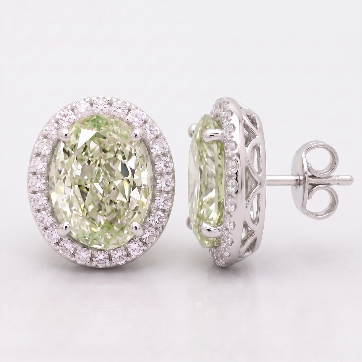 4.30 Carat Total Fancy Green Oval Diamond Halo Earrings