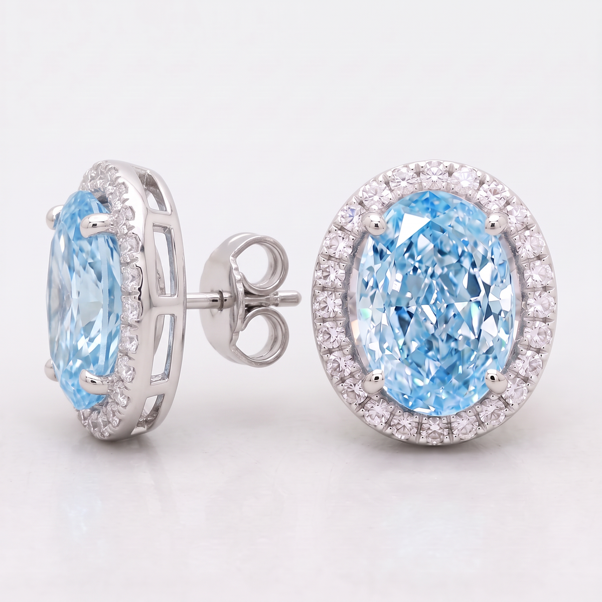 4.25 Carat Total Vivid Blue Oval Diamond Halo Earrings