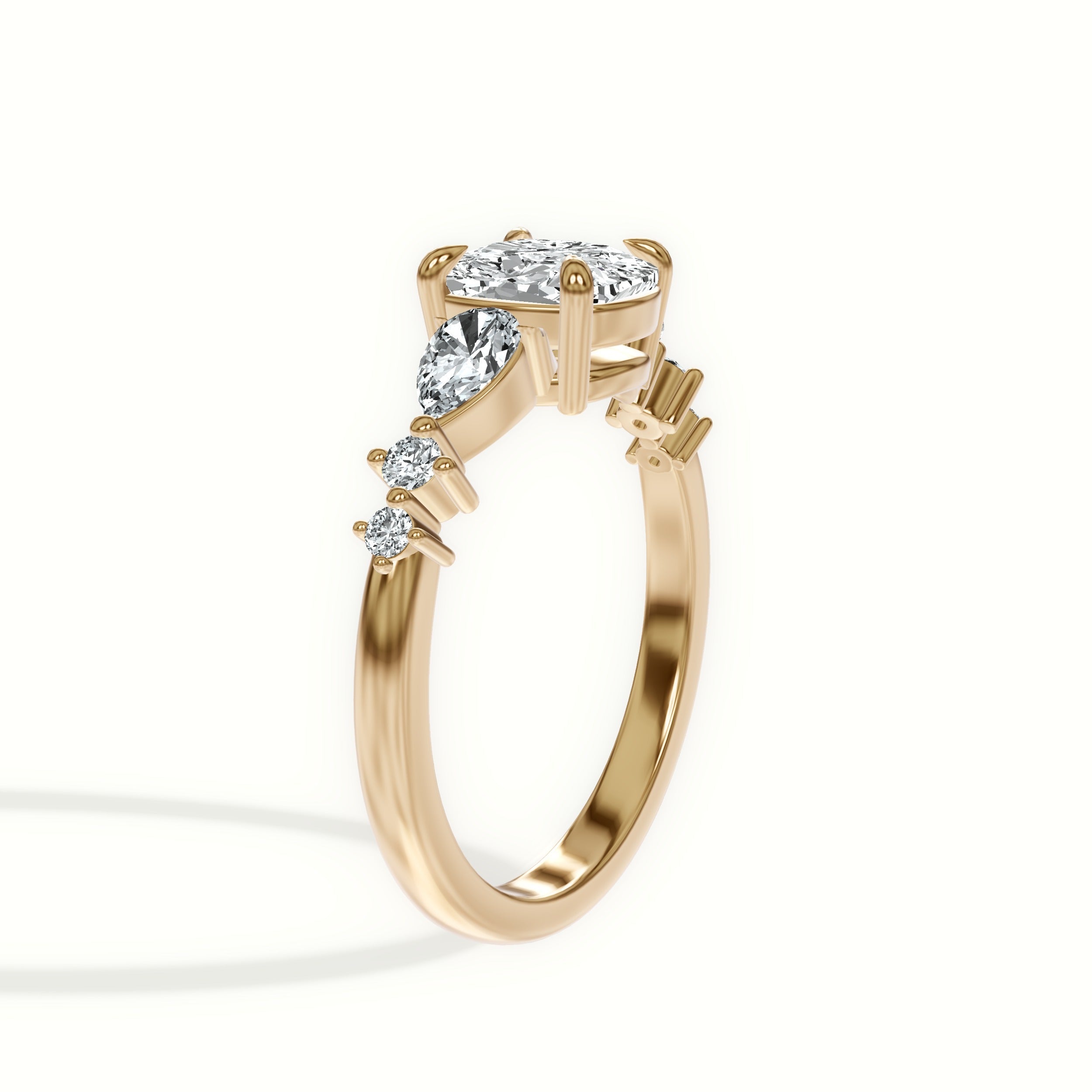 Cascading Pear and Round Diamond Engagement Ring