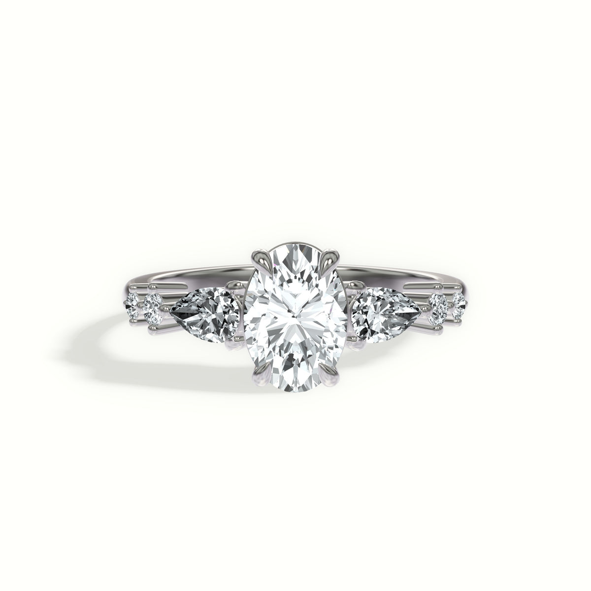 Cascading Pear and Round Diamonds Engagement Ring