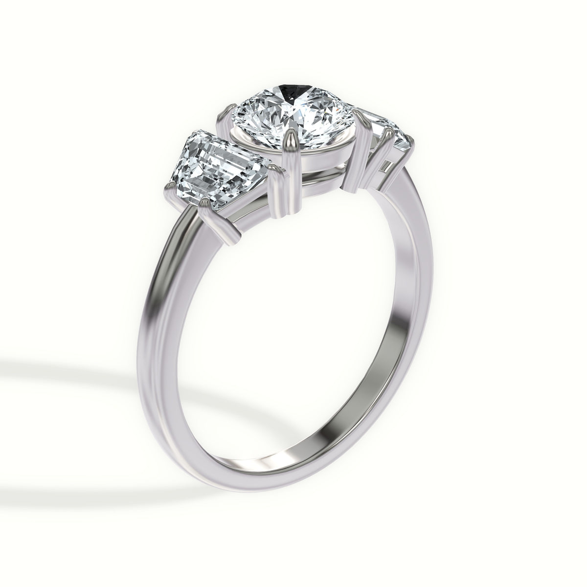Step Cut Trapezoid Three Stone Engagement Ring