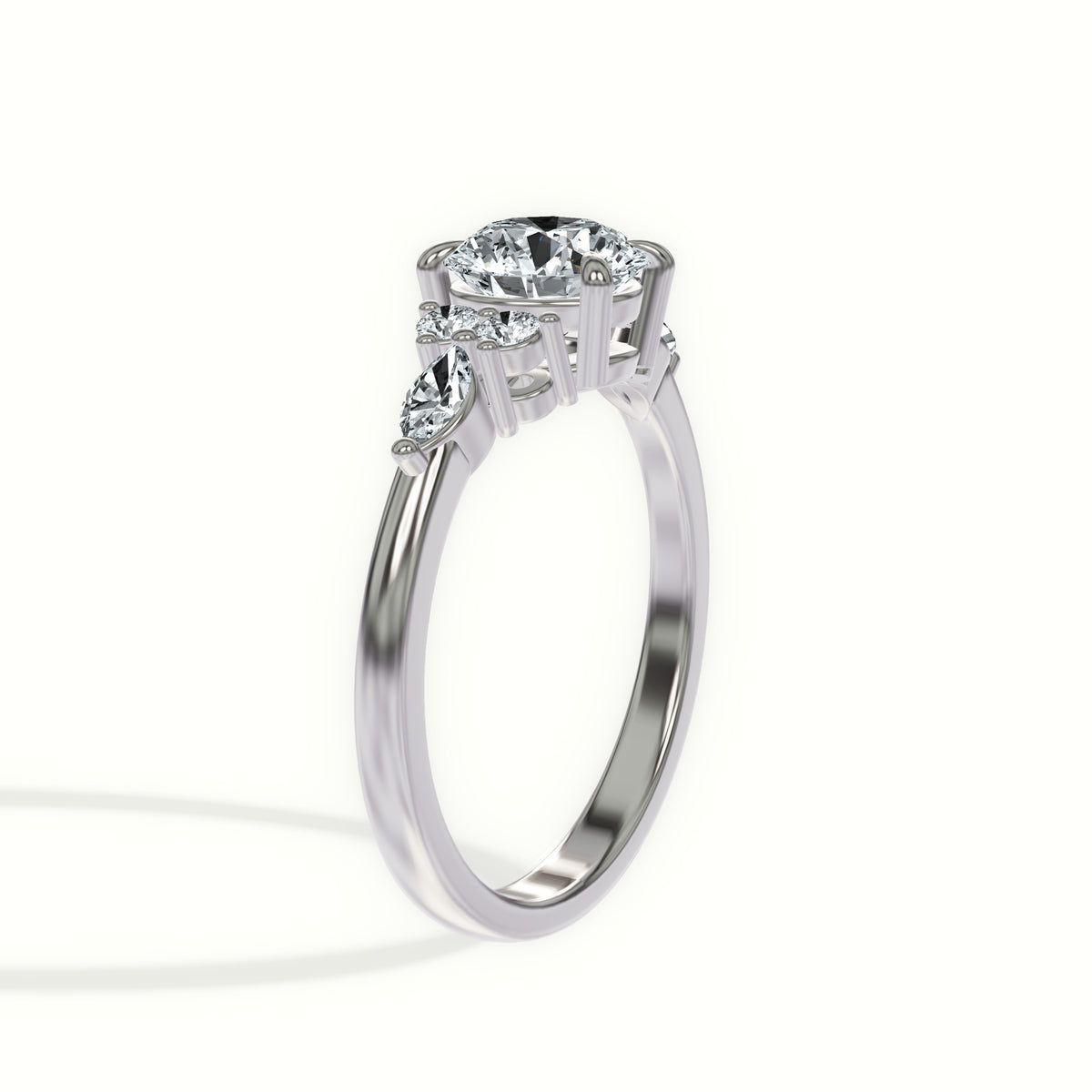 Romantic Pear and Round Accent Cluster Engagement Ring