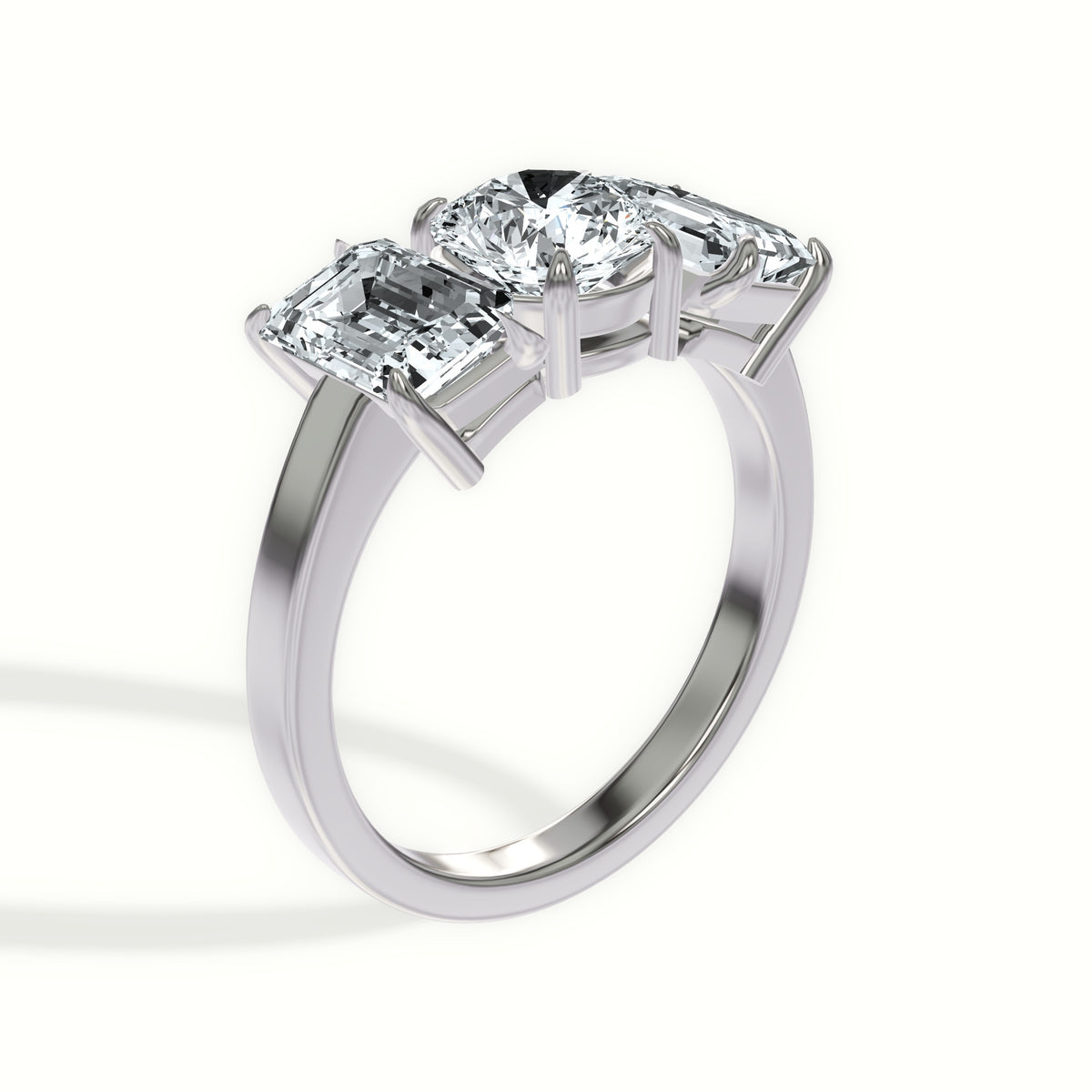 Classic Emerald Three Stone Engagement Ring