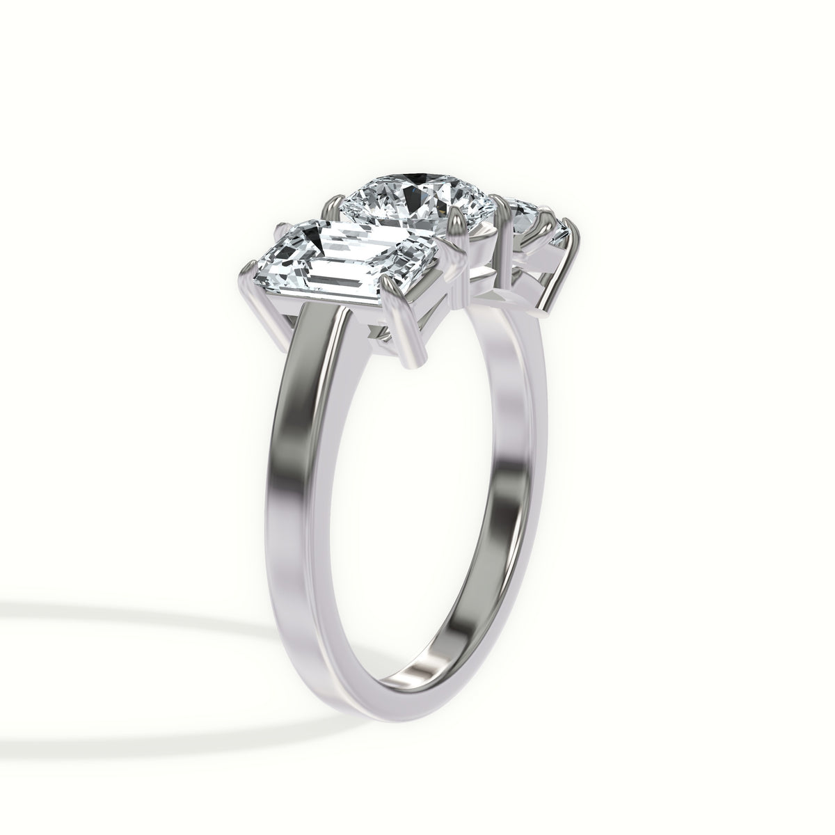 Classic Emerald Three Stone Engagement Ring