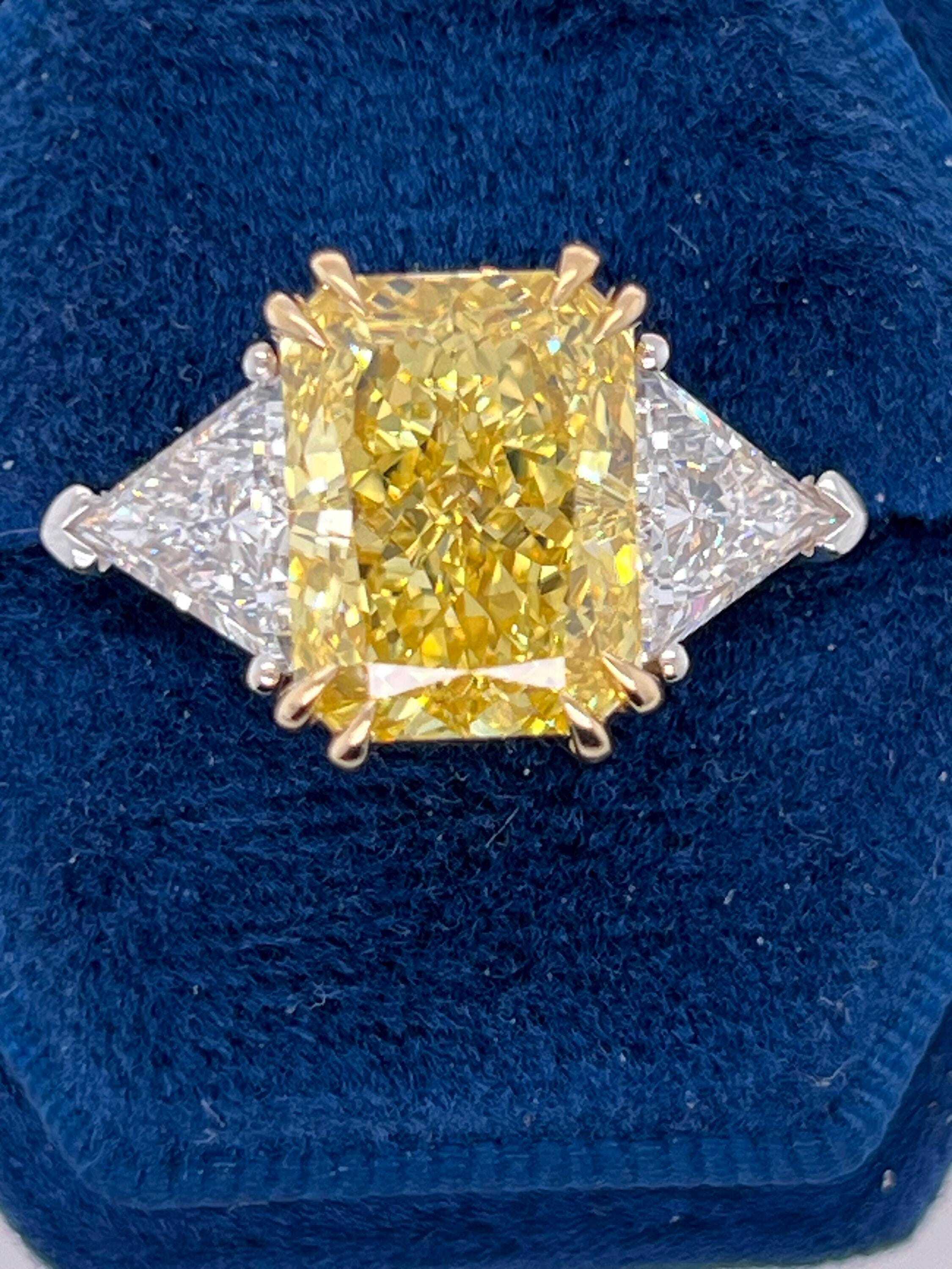 Fancy Vivid Yellow VVS1 Clarity 9.25 Carat Total Radiant Cut Diamond Three Stone Side Trillions, Two Tone Engagement Ring