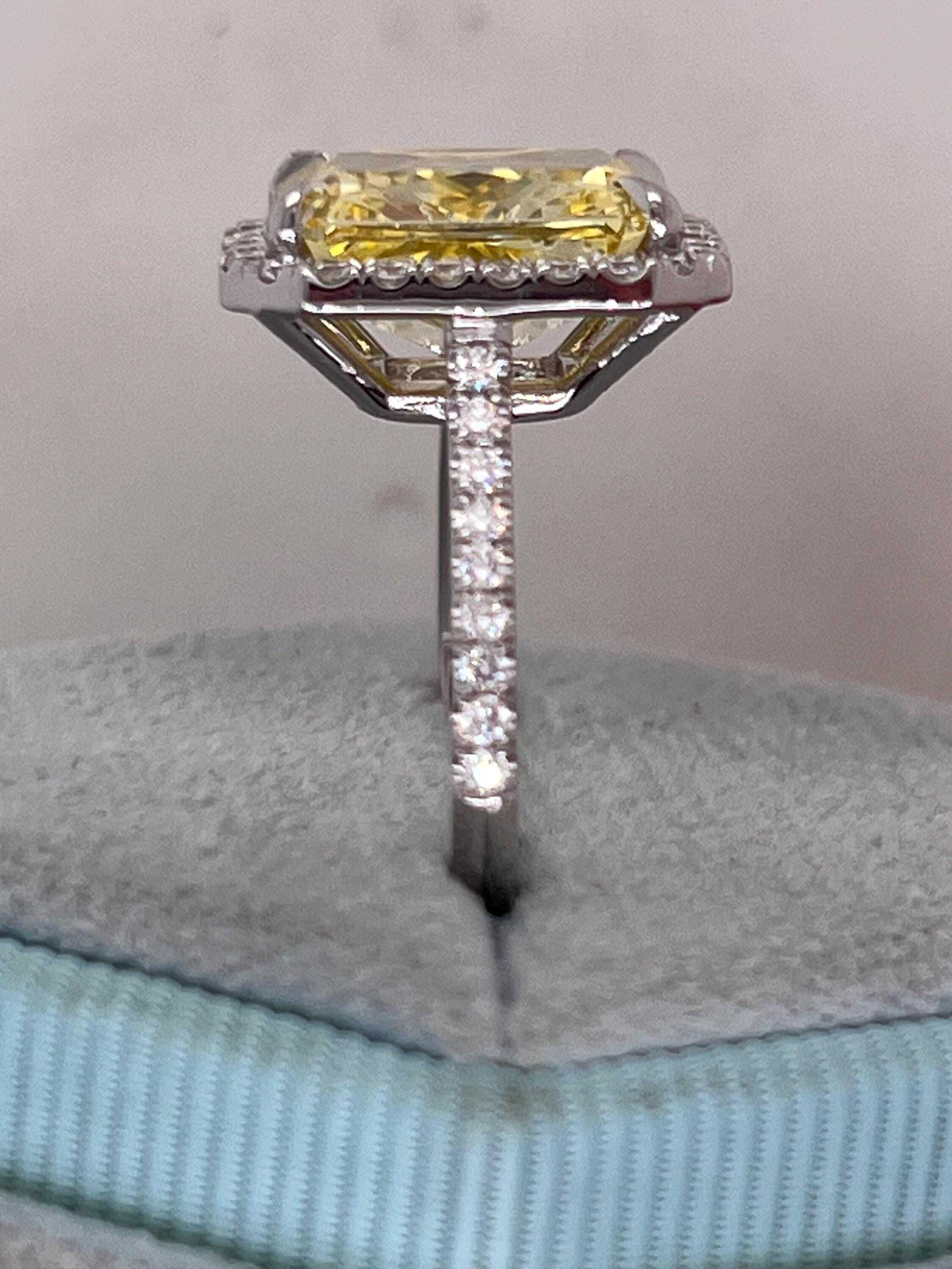 5.5 Carat Total Fancy Vivid Yellow Elongated Radiant Cut Diamond Halo Engagement Ring
