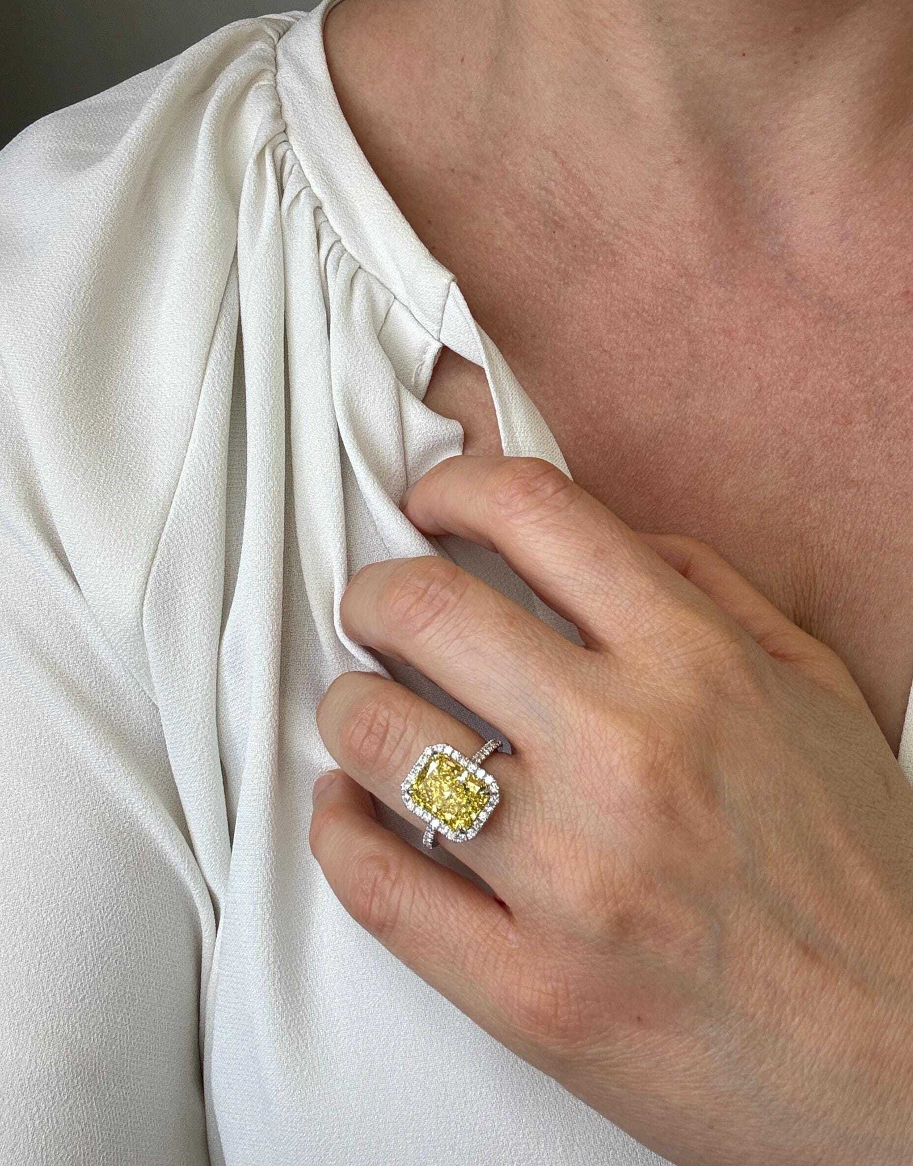 5.5 Carat Total Fancy Vivid Yellow Elongated Radiant Cut Diamond Halo Engagement Ring