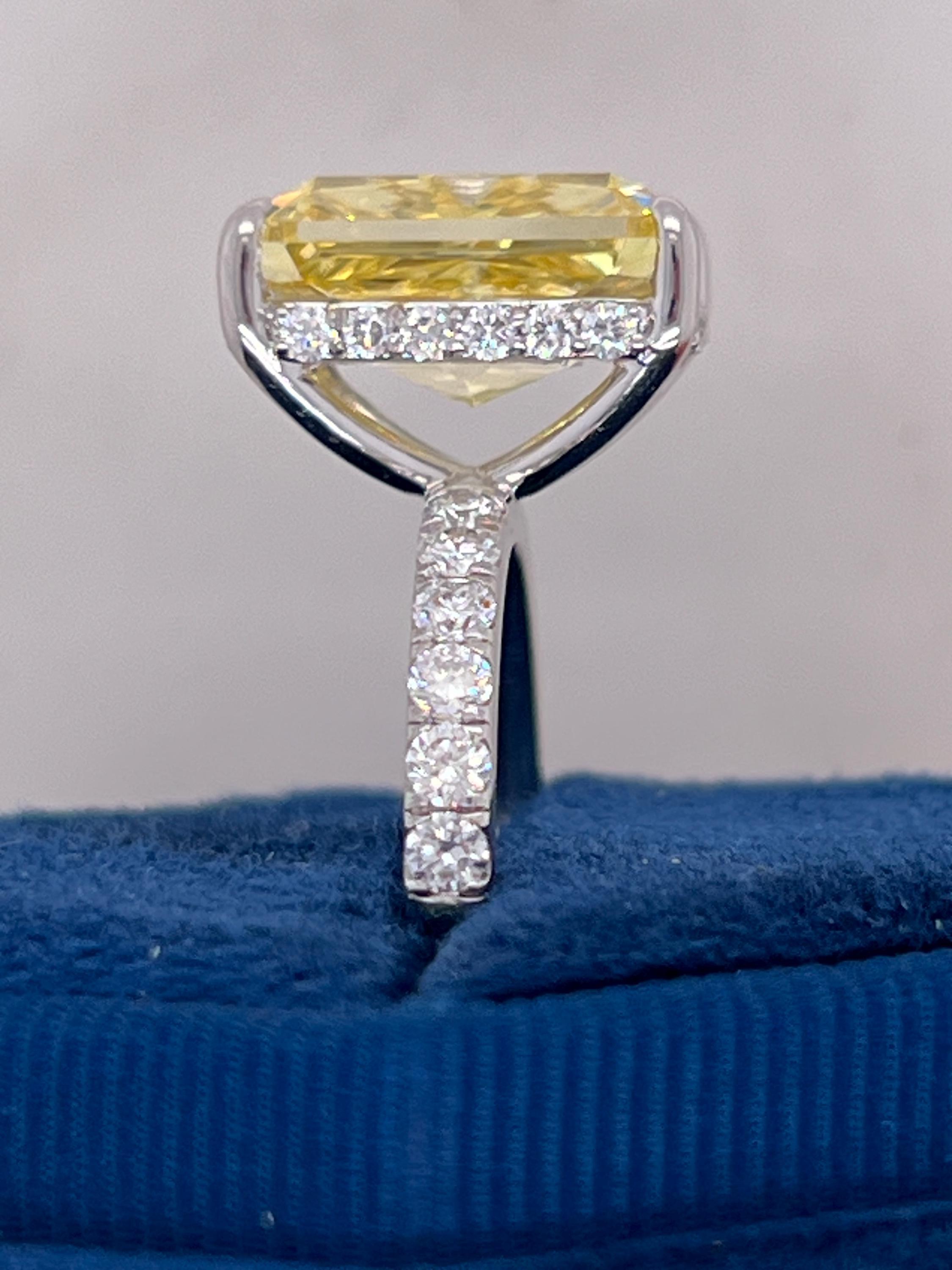 7.25 Carat Total Fancy Vivid Yellow VVS1 Clarity Elongated Radiant Cut Diamond Hidden Halo Engagement Ring