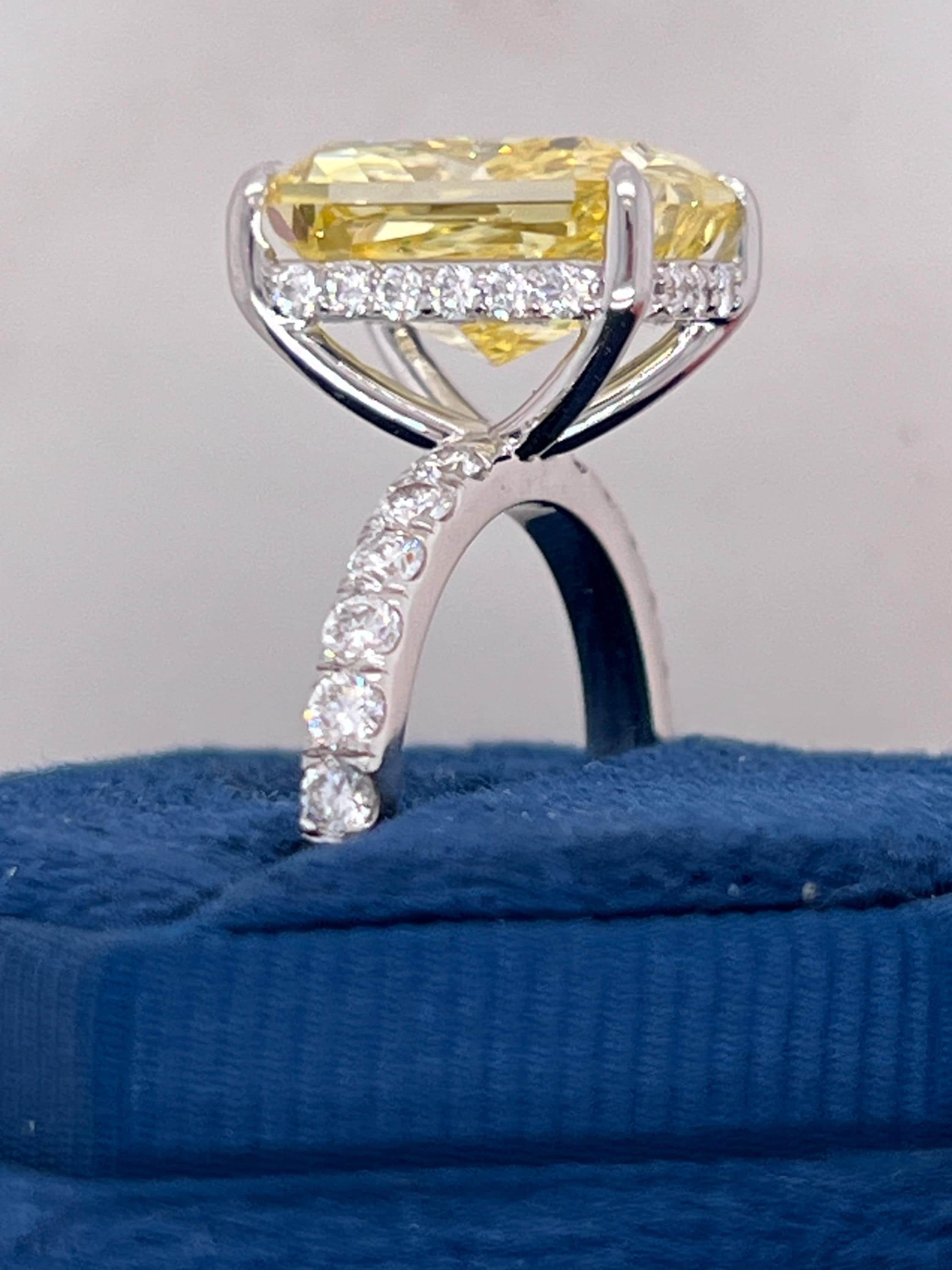 7.25 Carat Total Fancy Vivid Yellow VVS1 Clarity Elongated Radiant Cut Diamond Hidden Halo Engagement Ring