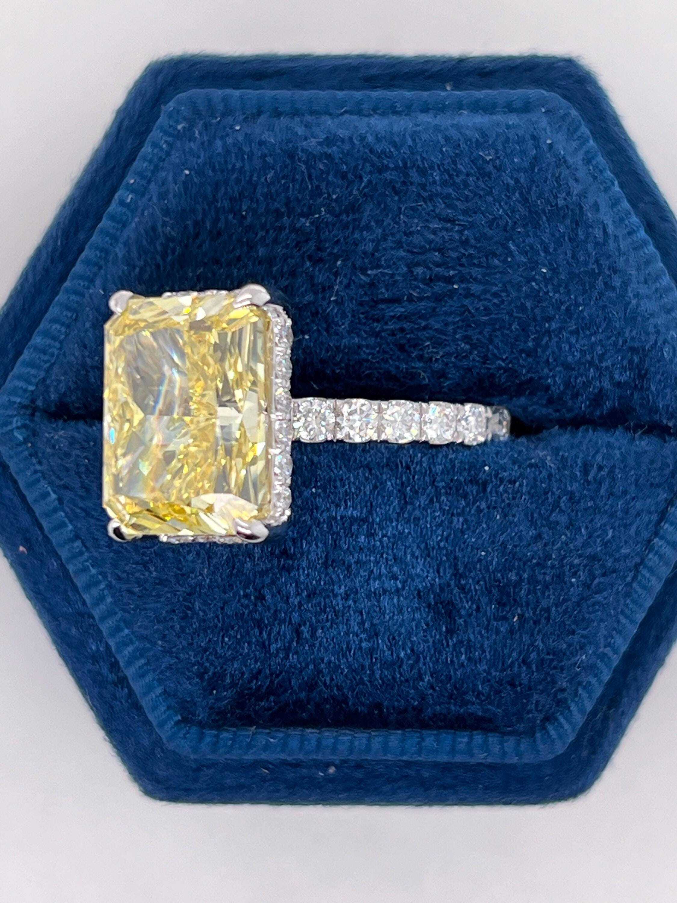 7.25 Carat Total Fancy Vivid Yellow VVS1 Clarity Elongated Radiant Cut Diamond Hidden Halo Engagement Ring