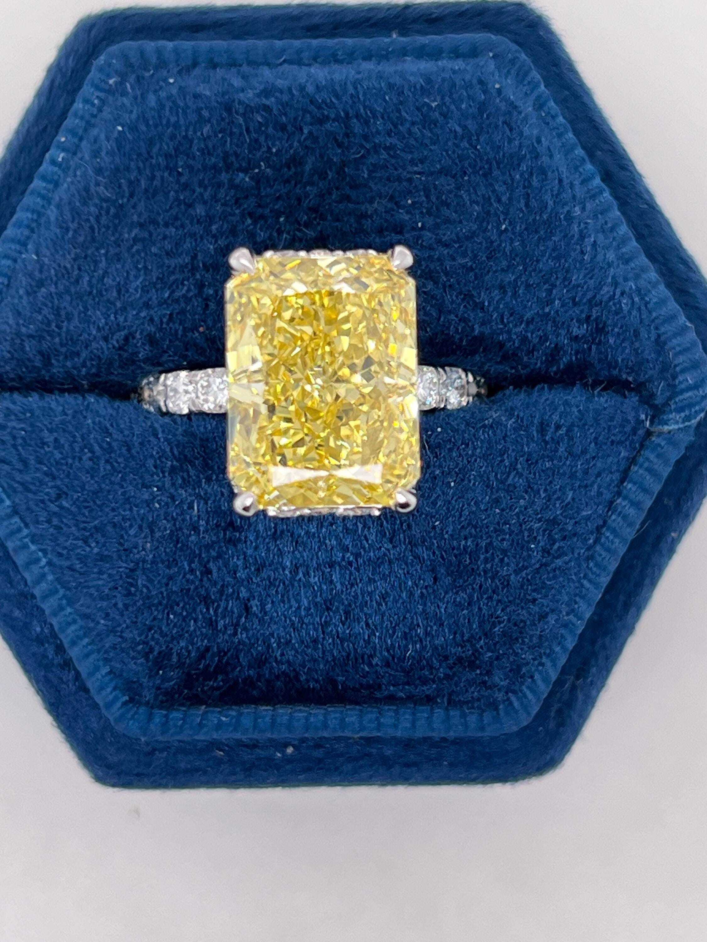 7.25 Carat Total Fancy Vivid Yellow VVS1 Clarity Elongated Radiant Cut Diamond Hidden Halo Engagement Ring