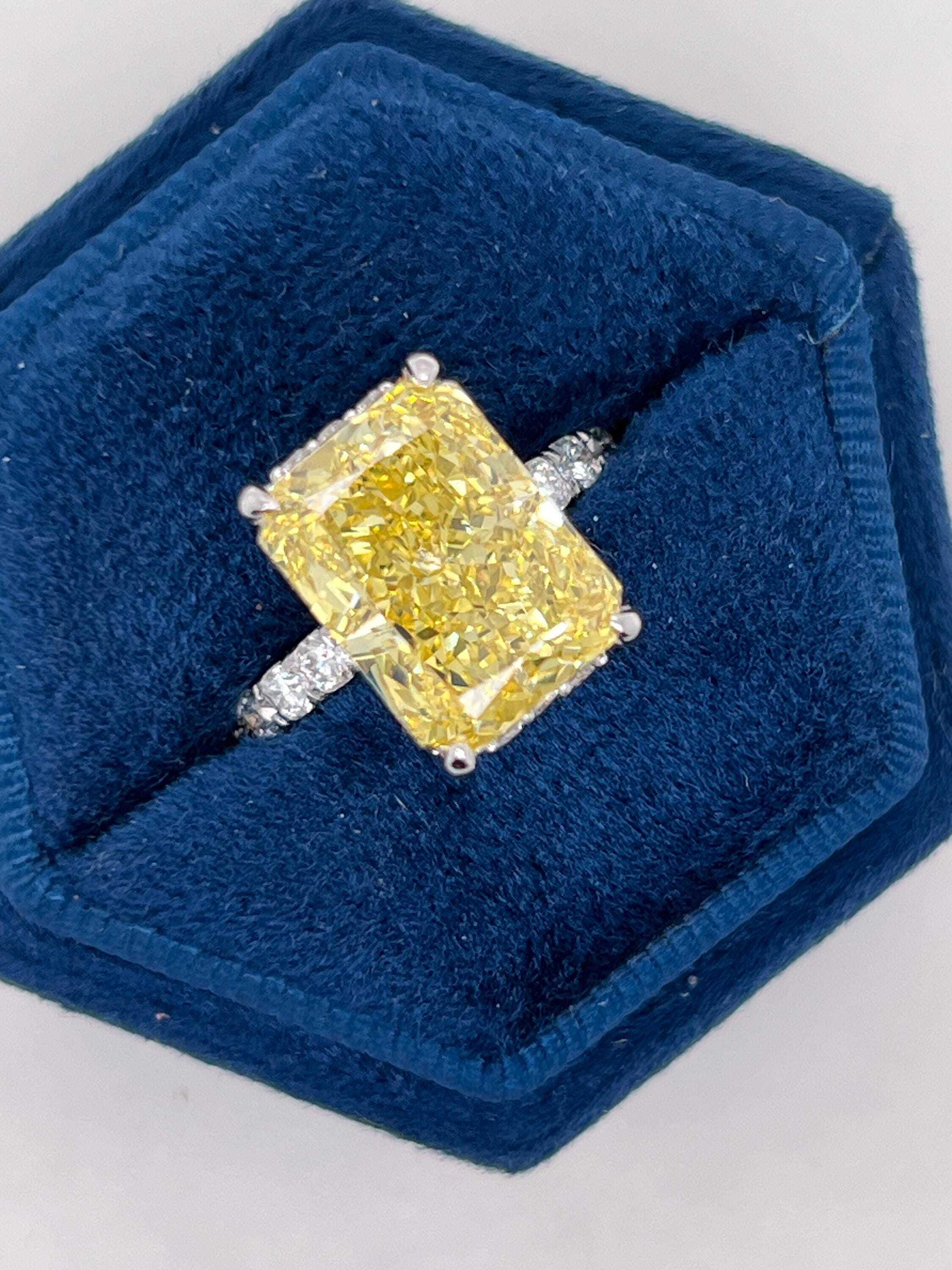 7.25 Carat Total Fancy Vivid Yellow VVS1 Clarity Elongated Radiant Cut Diamond Hidden Halo Engagement Ring
