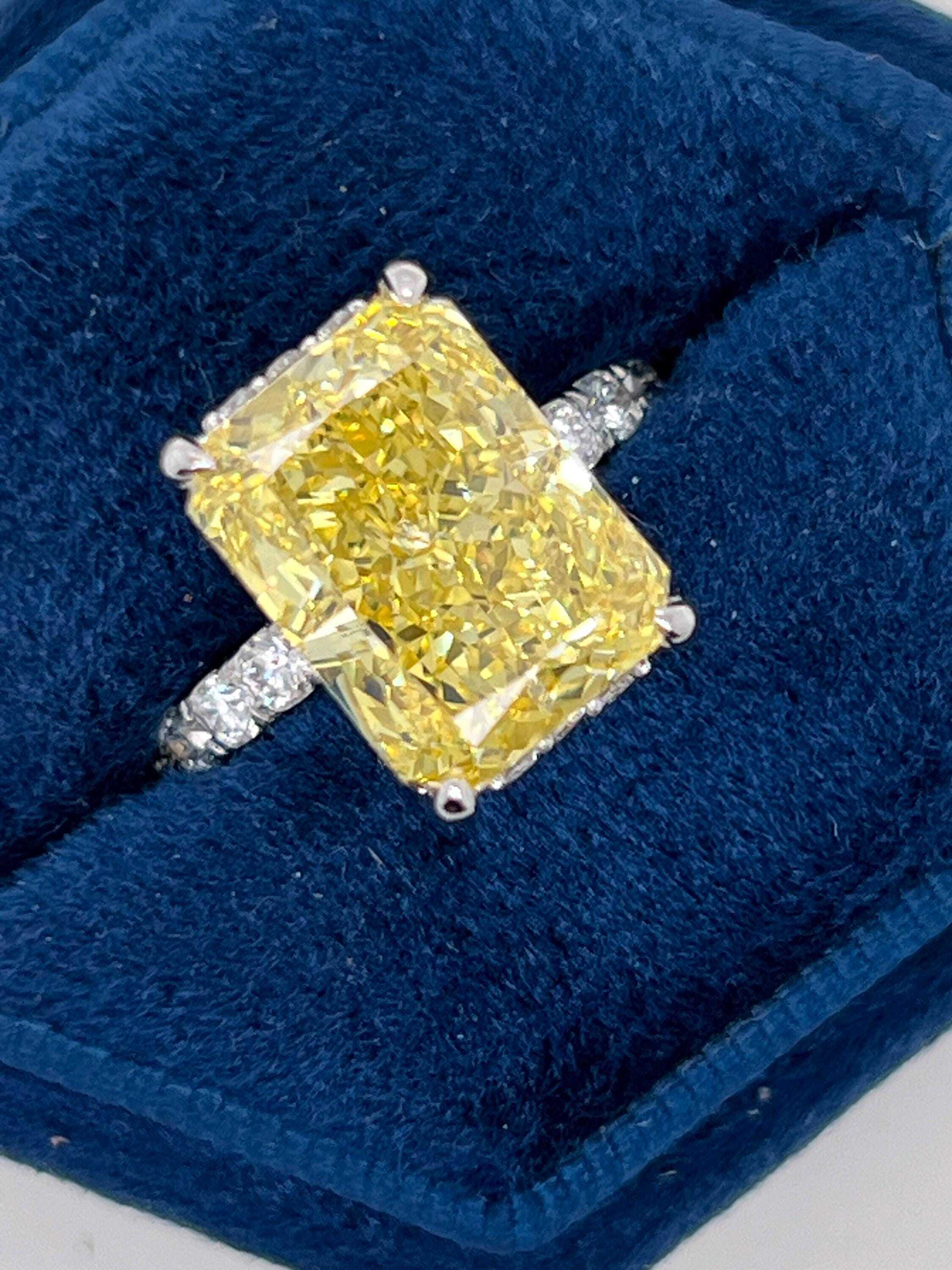 7.25 Carat Total Fancy Vivid Yellow VVS1 Clarity Elongated Radiant Cut Diamond Hidden Halo Engagement Ring