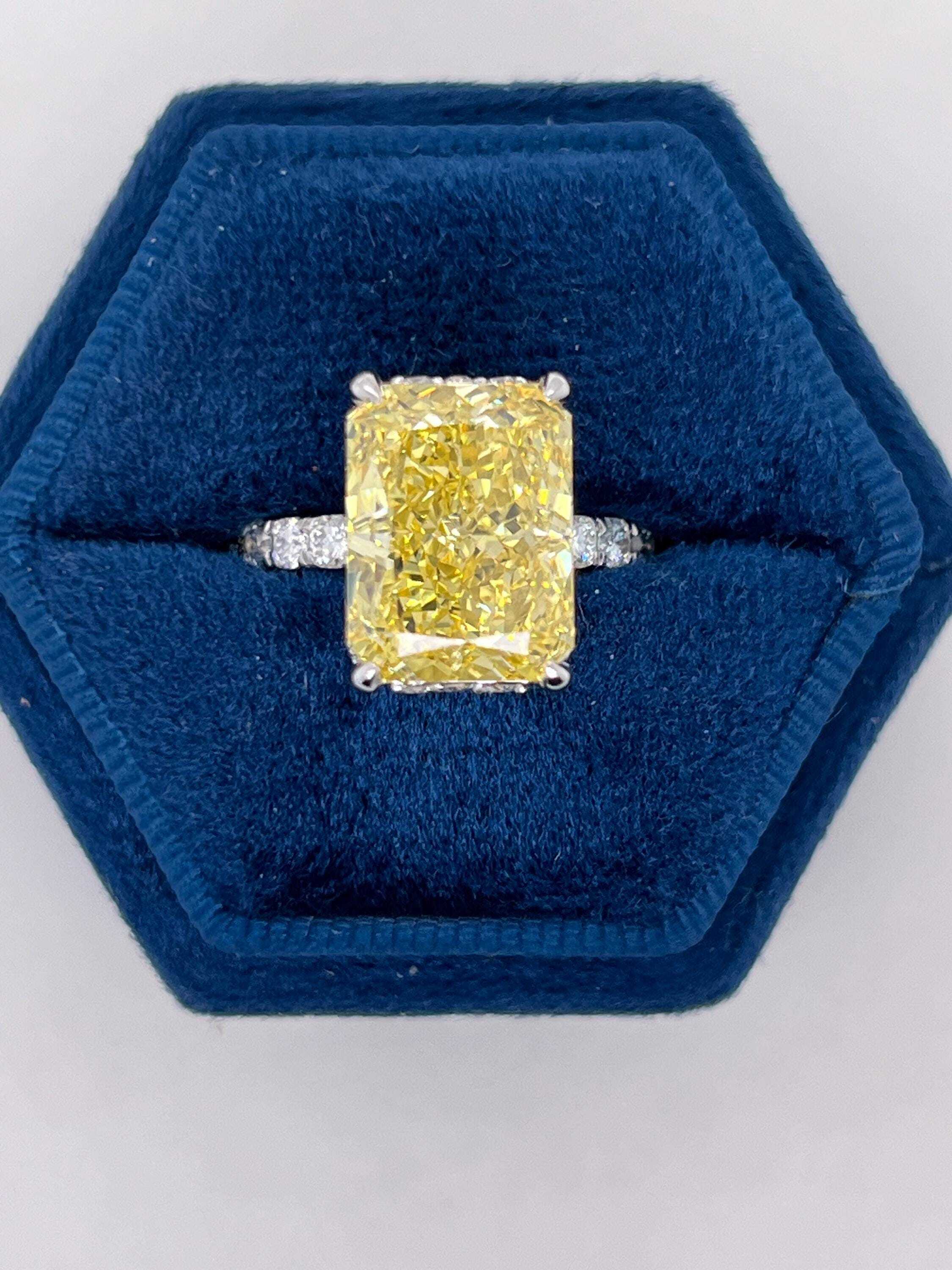 7.25 Carat Total Fancy Vivid Yellow VVS1 Clarity Elongated Radiant Cut Diamond Hidden Halo Engagement Ring