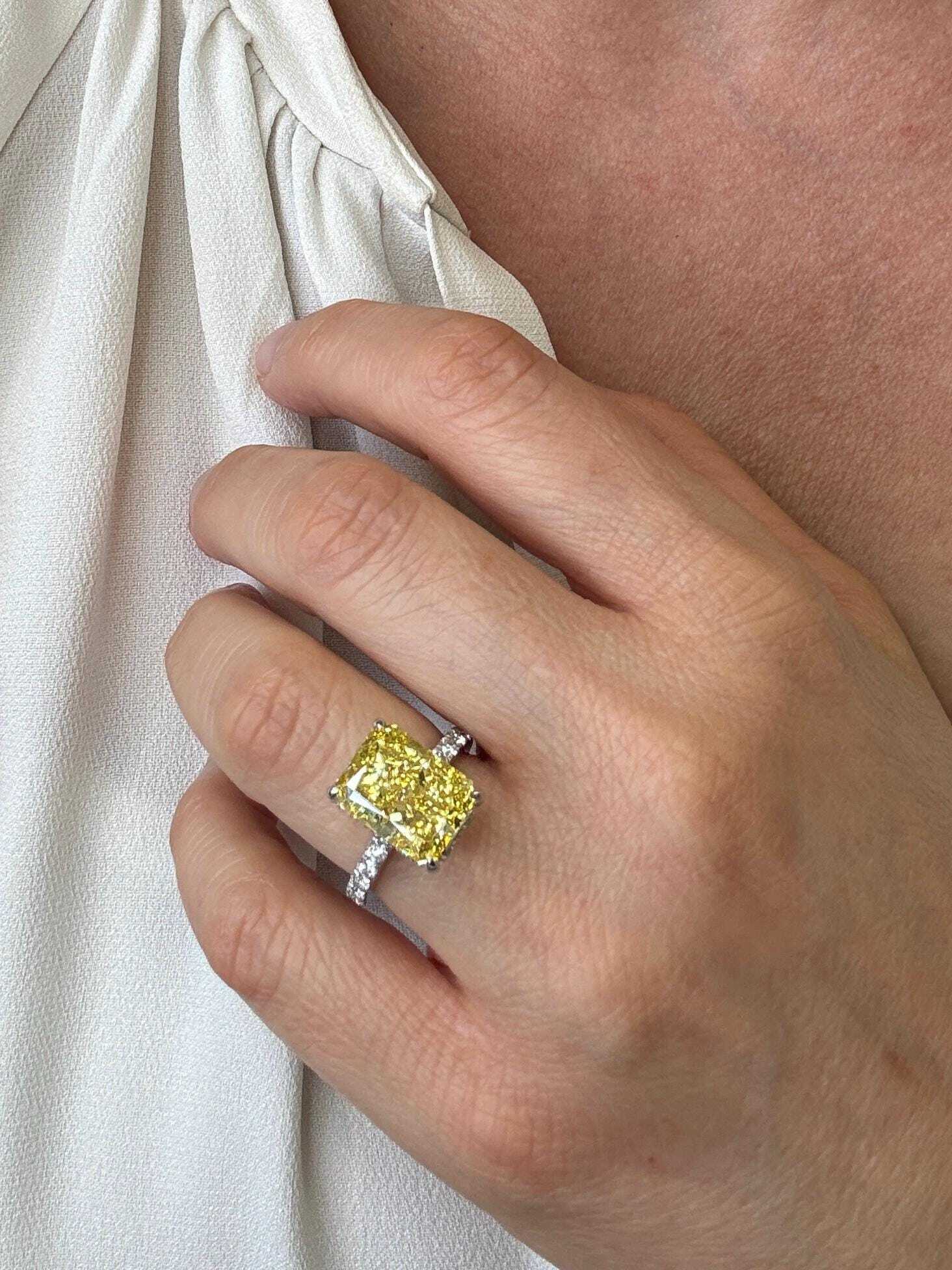 7.25 Carat Total Fancy Vivid Yellow VVS1 Clarity Elongated Radiant Cut Diamond Hidden Halo Engagement Ring