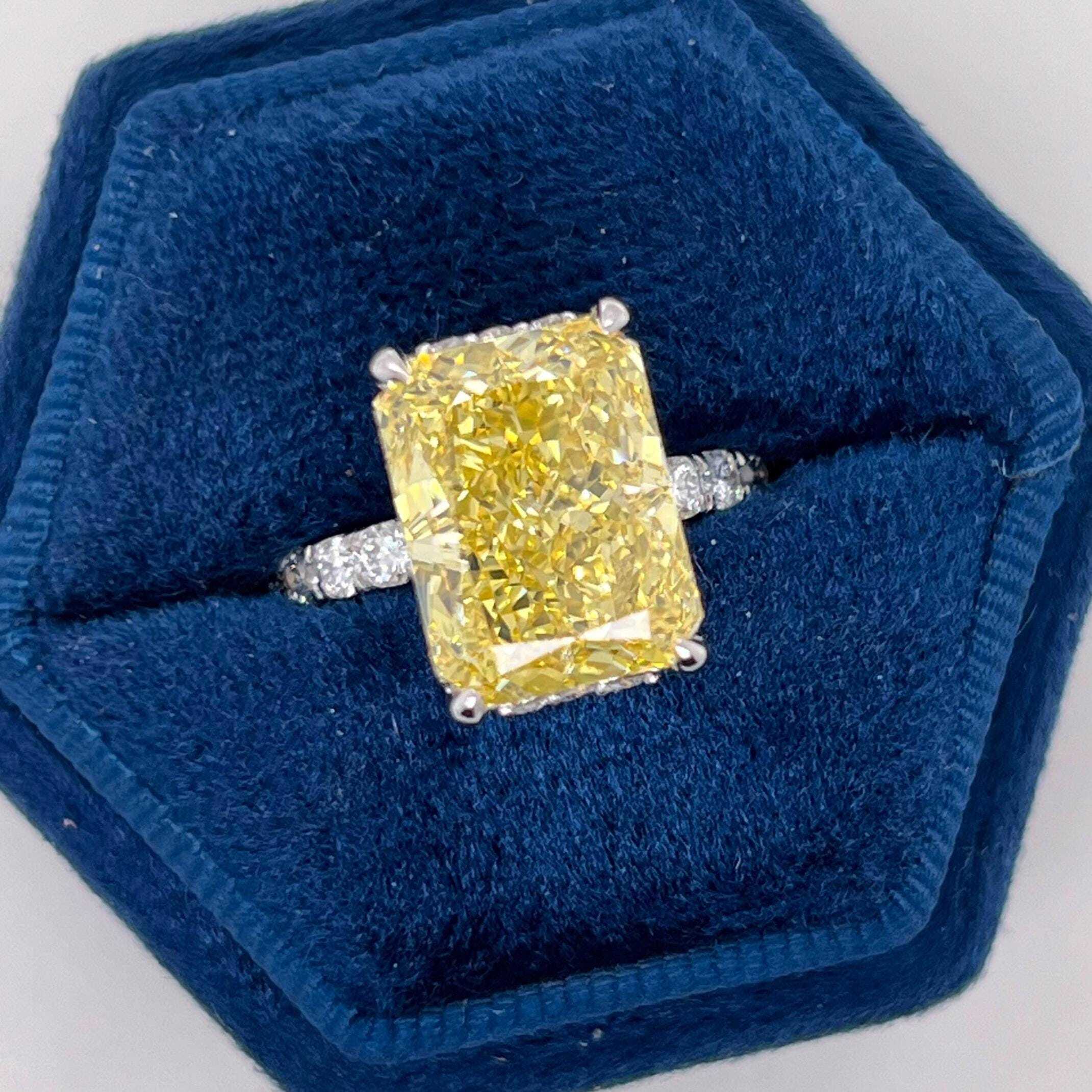 7.25 Carat Total Fancy Vivid Yellow VVS1 Clarity Elongated Radiant Cut Diamond Hidden Halo Engagement Ring