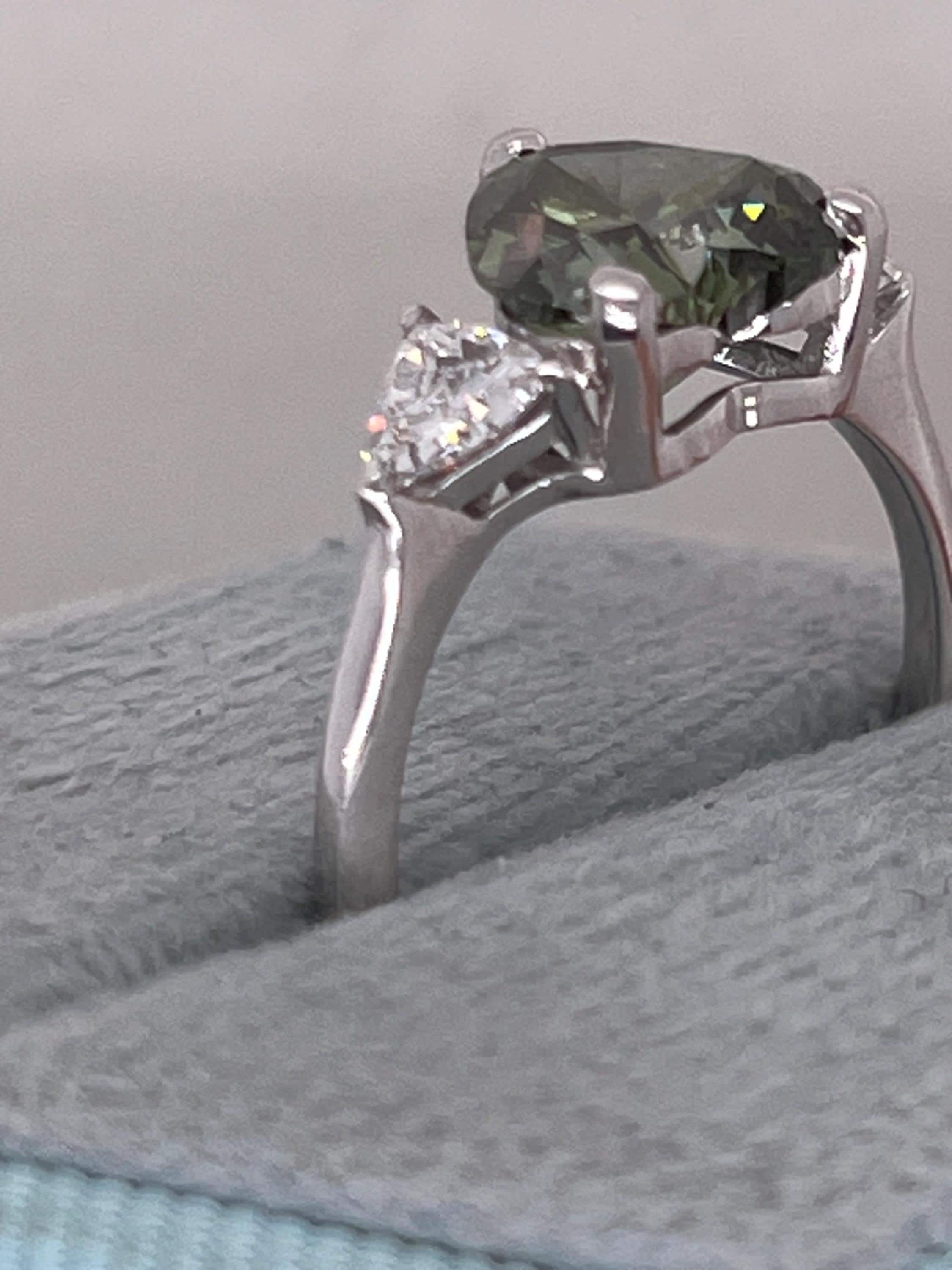 2.75 Carat Fancy Vivid Green Heart Cut Diamond Three Stone Engagement Ring Side Trillions