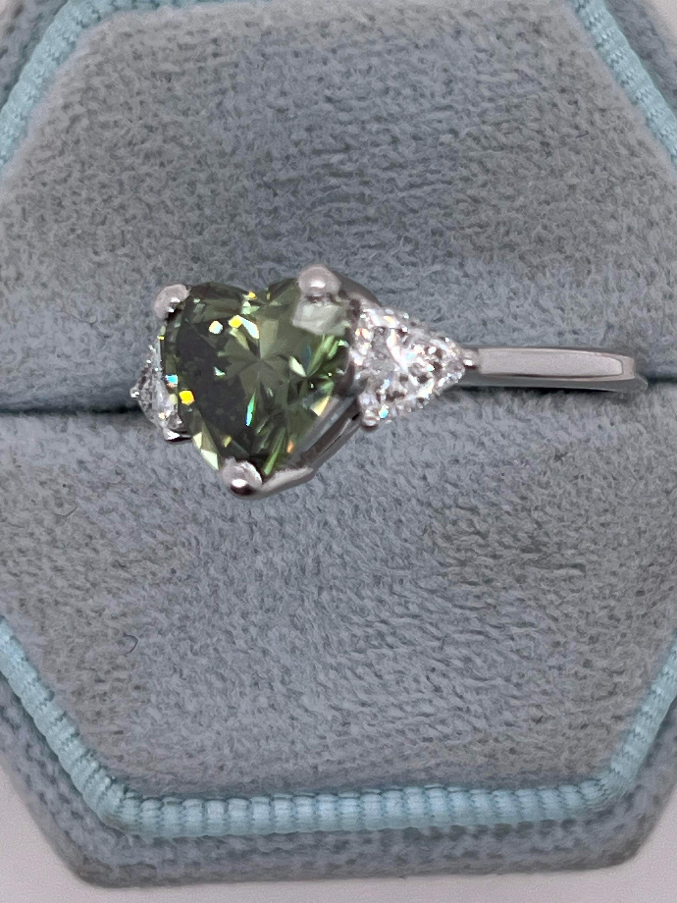 2.75 Carat Fancy Vivid Green Heart Cut Diamond Three Stone Engagement Ring Side Trillions