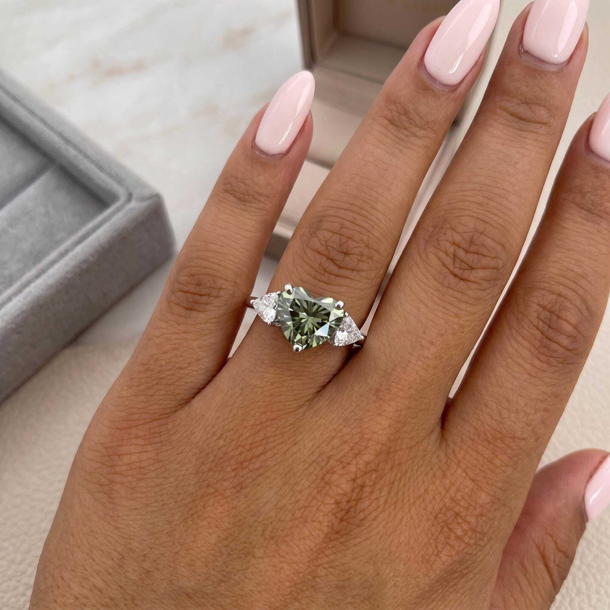 2.75 Carat Fancy Vivid Green Heart Cut Diamond Three Stone Engagement Ring Side Trillions