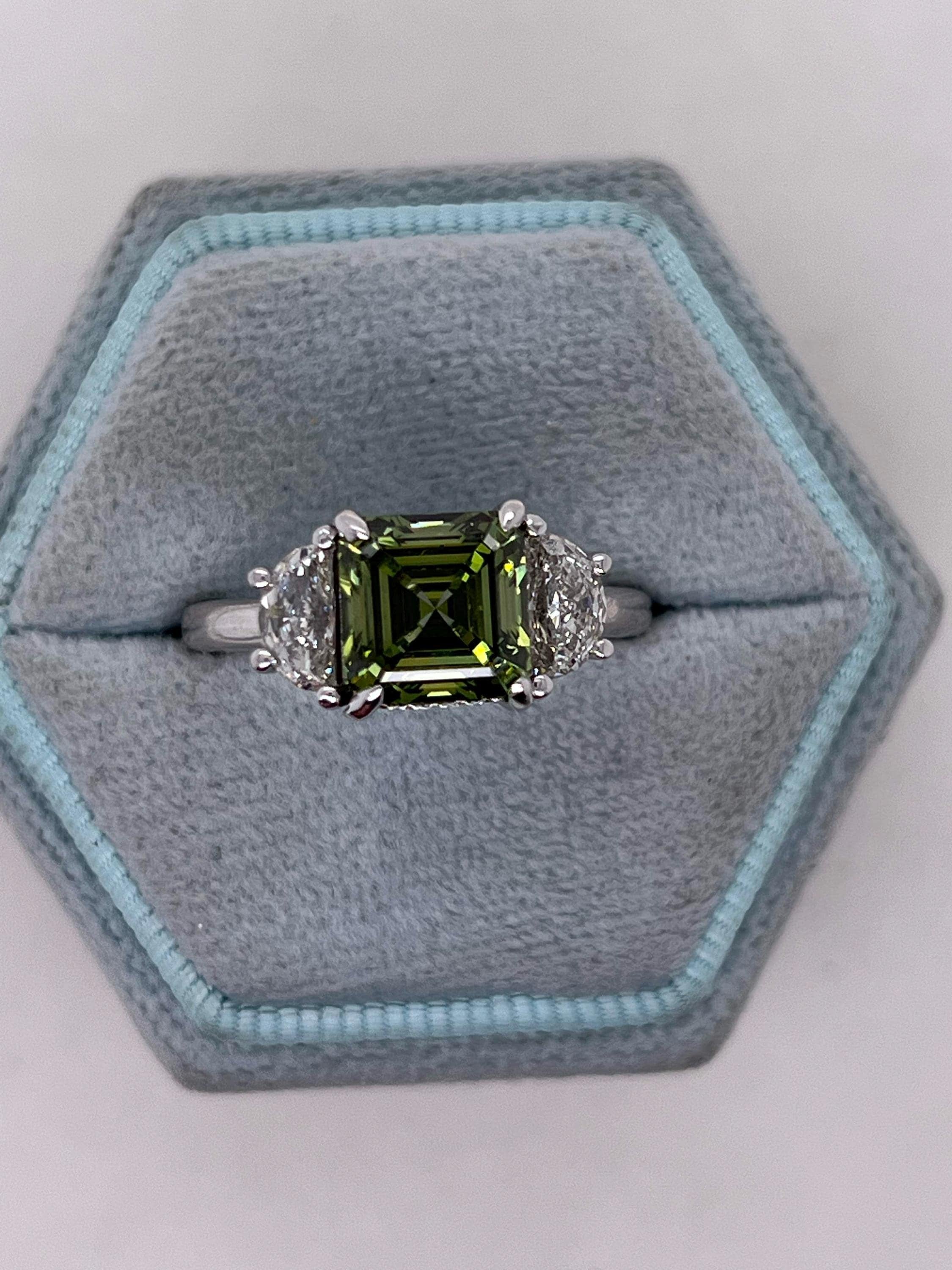 3.25 Carat Vivid Green Color Asscher Cut Diamond Hidden Halo Three Stone Engagement Ring