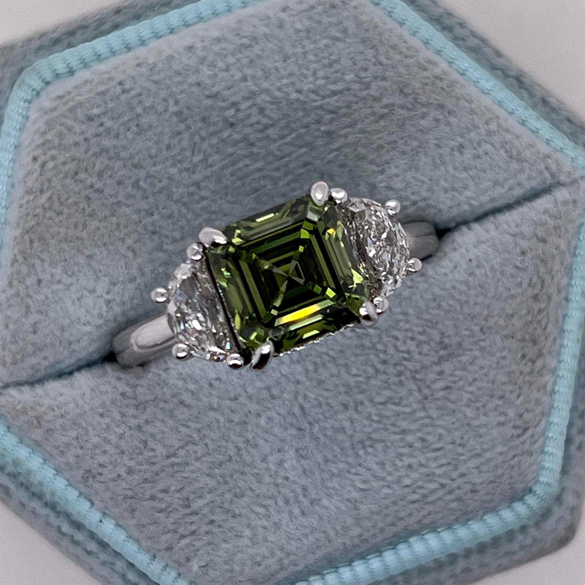 3.25 Carat Vivid Green Color Asscher Cut Diamond Hidden Halo Three Stone Engagement Ring