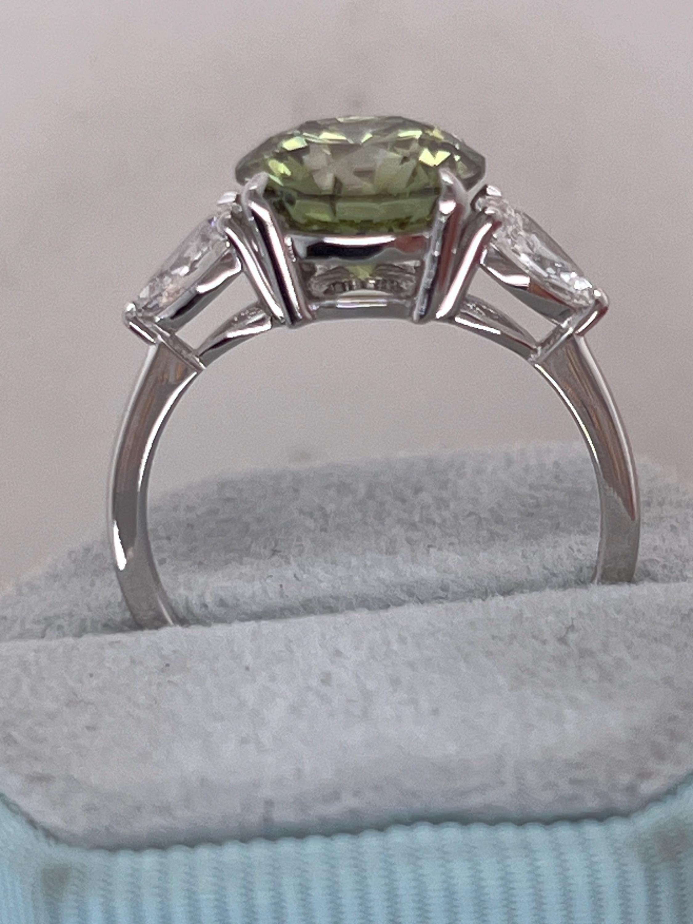 3.5 Carat Fancy Vivid Green VVS1 Clarity Round Cut Diamond Three Stone Engagement Ring Side Pears