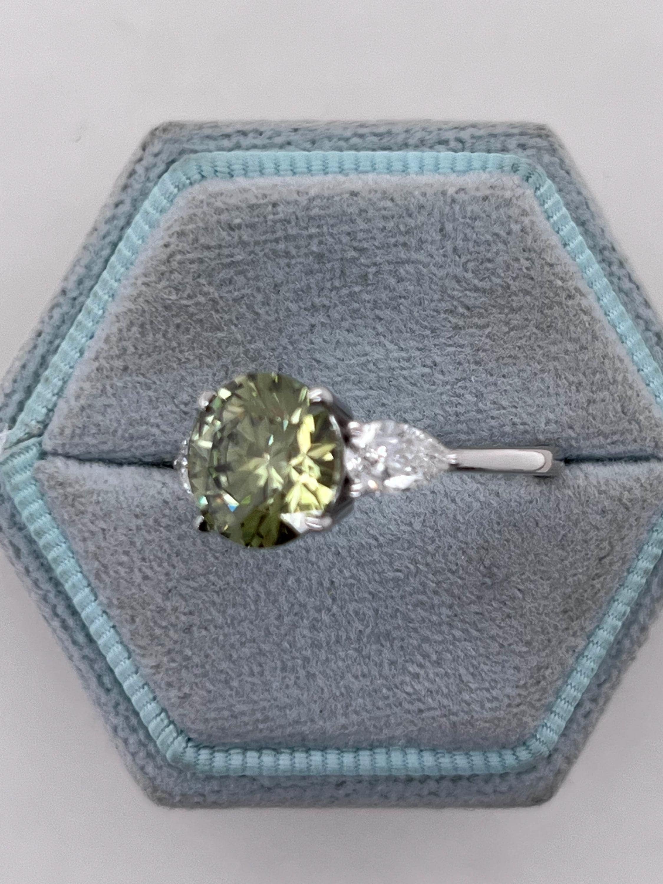 3.5 Carat Fancy Vivid Green VVS1 Clarity Round Cut Diamond Three Stone Engagement Ring Side Pears