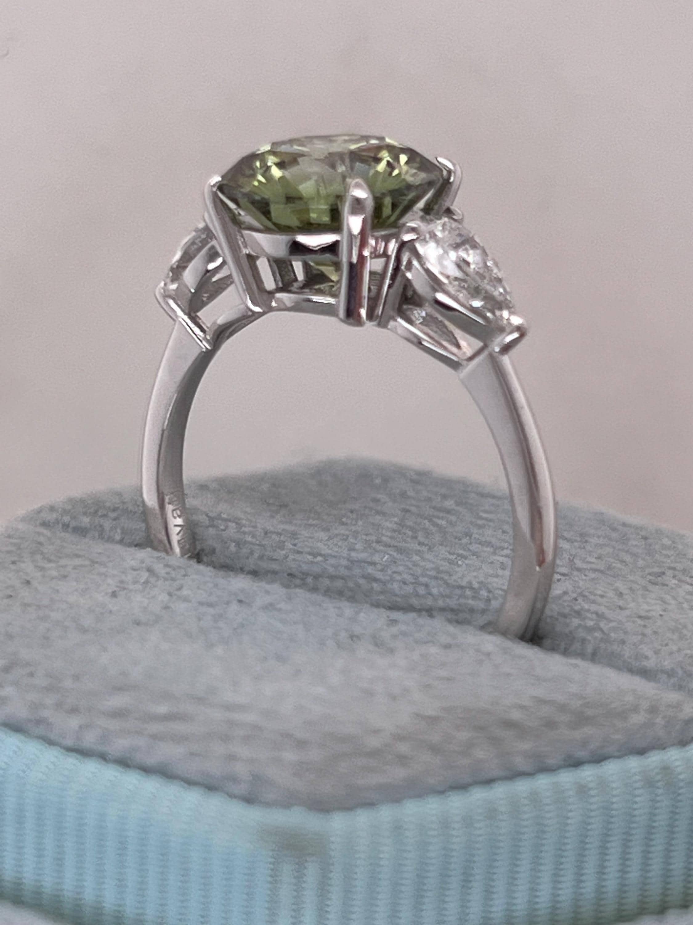 3.5 Carat Fancy Vivid Green VVS1 Clarity Round Cut Diamond Three Stone Engagement Ring Side Pears