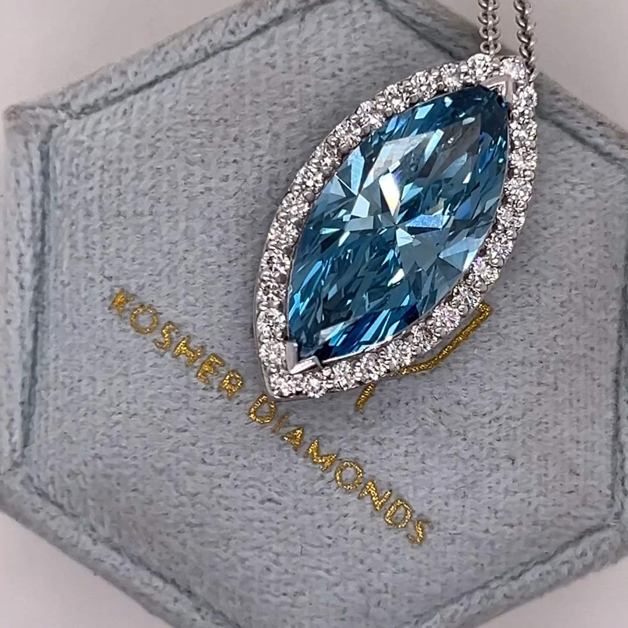 7.5 Carat Fancy Vivid Blue Color Marquise Cut Diamond Halo Pendant