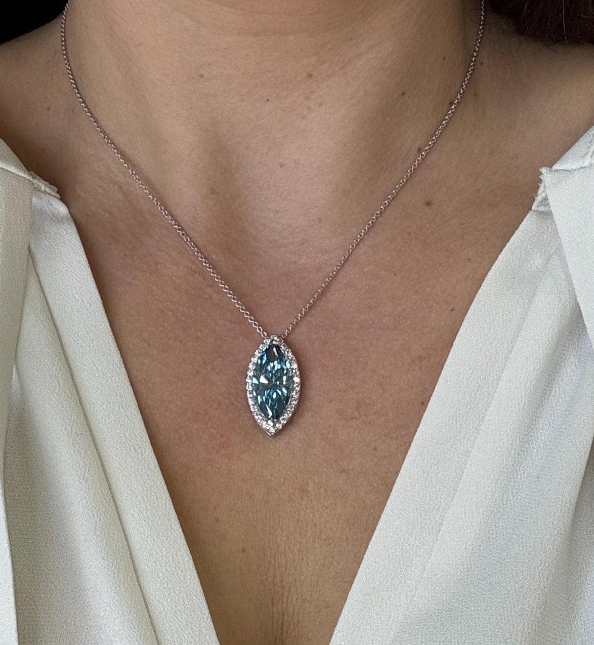 7.5 Carat Fancy Vivid Blue Color Marquise Cut Diamond Halo Pendant